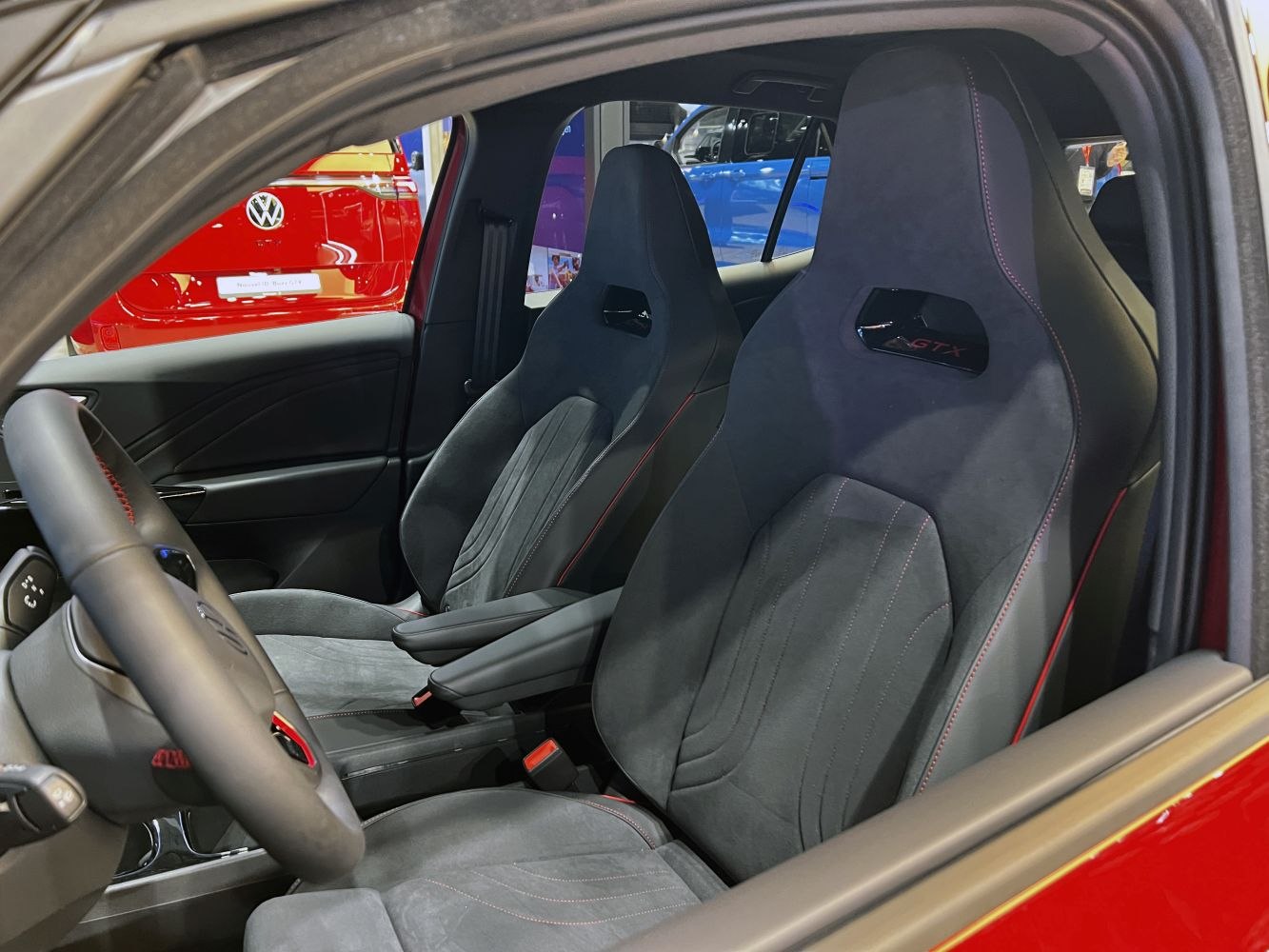 Sporty GTX front seats and steering wheel with red stitching details