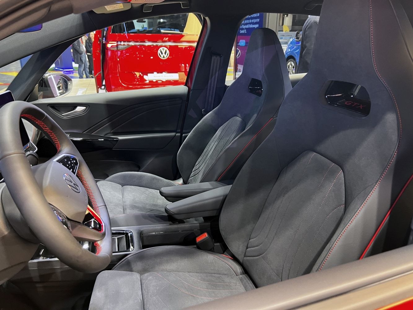 GTX-branded sport seats with red stitching and modern steering wheel.