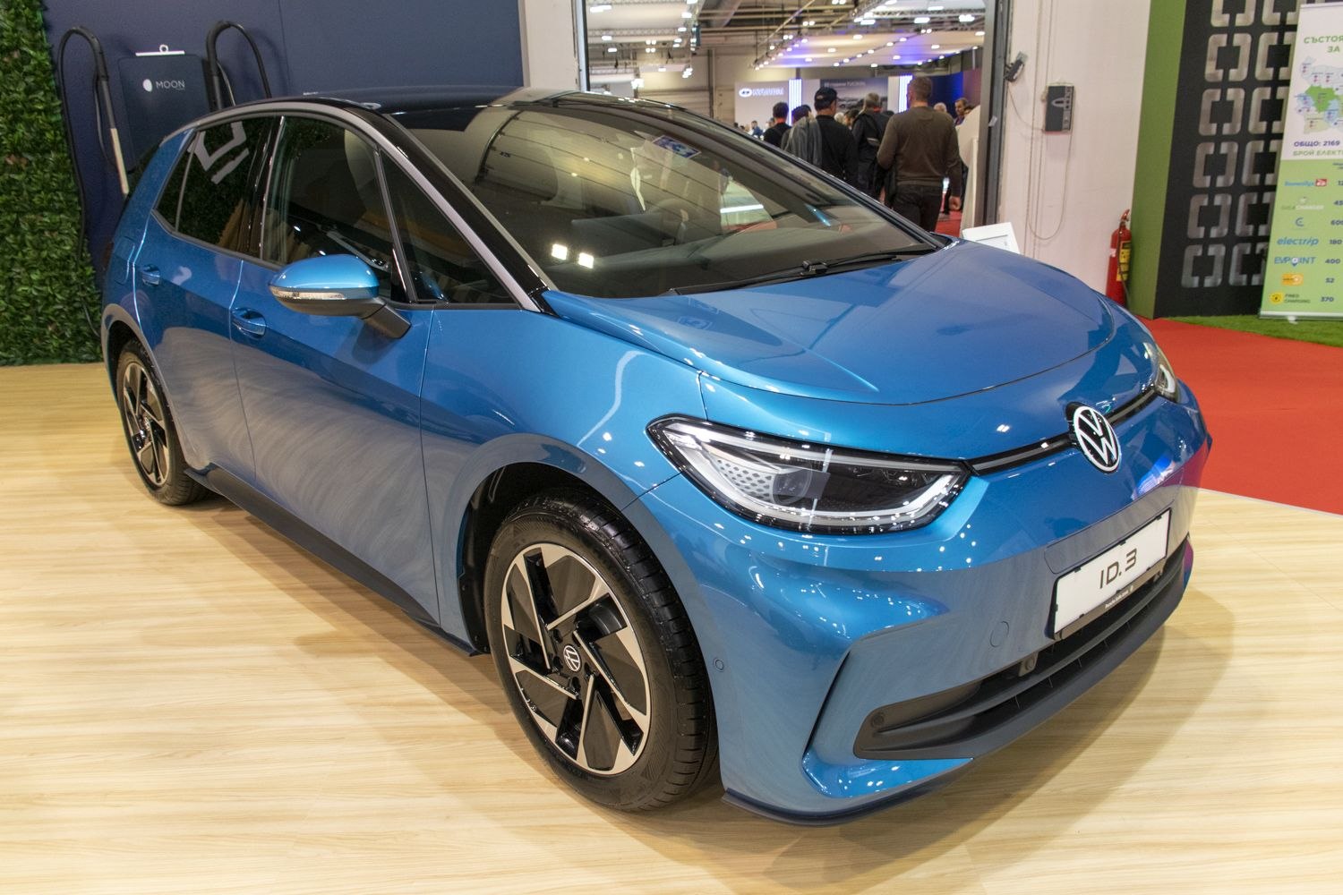 Sleek LED headlights and aerodynamic alloy wheels on a modern electric hatchback