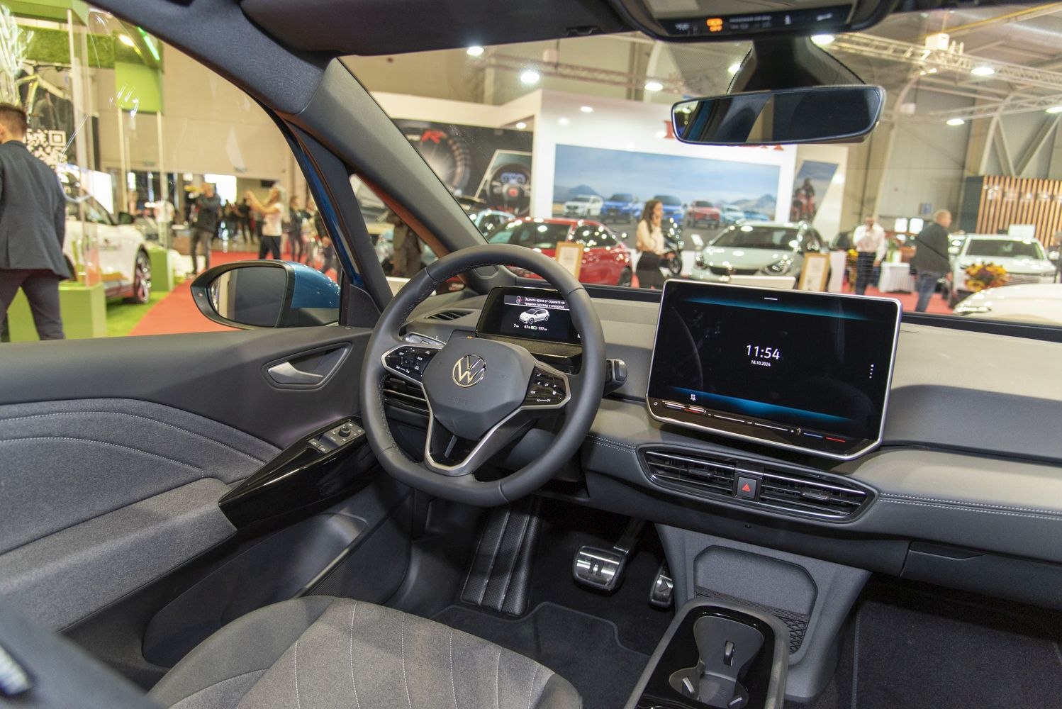 Modern digital dashboard and touchscreen infotainment in an electric car interior