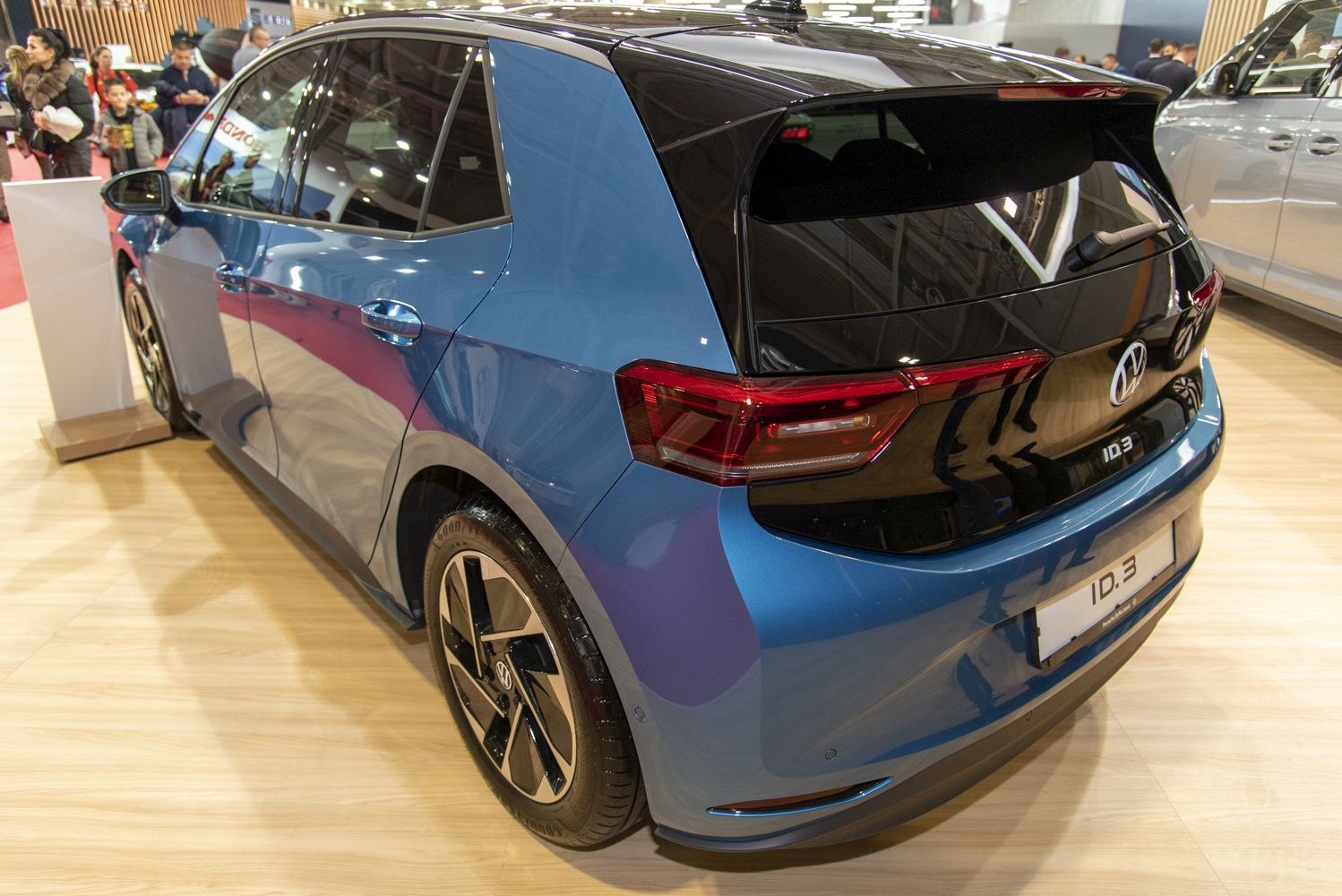 Rear view of a hatchback with modern taillights and unique wheel rims