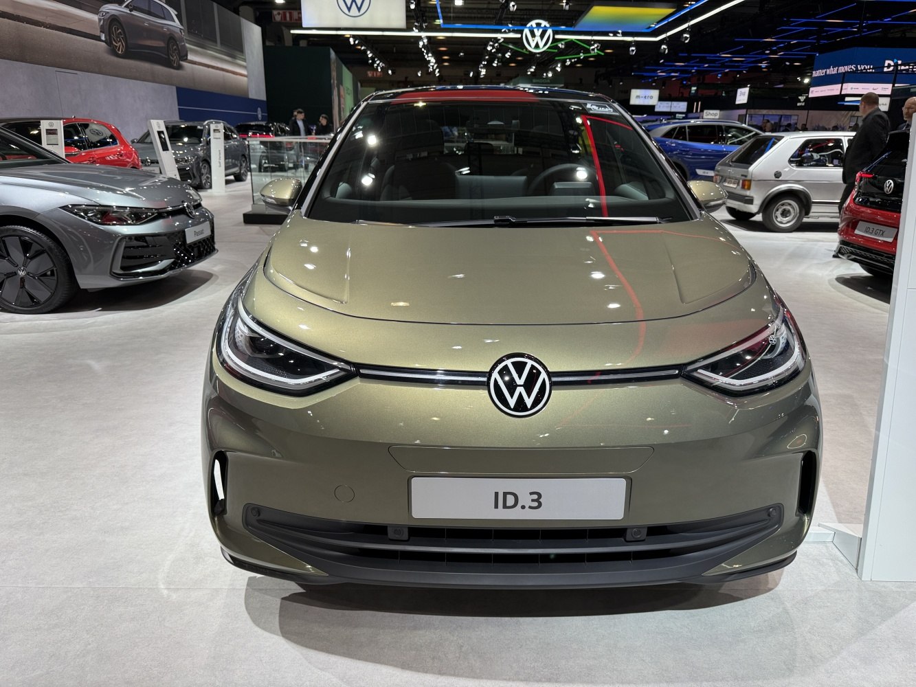 Front view with LED headlights and smooth hood design.