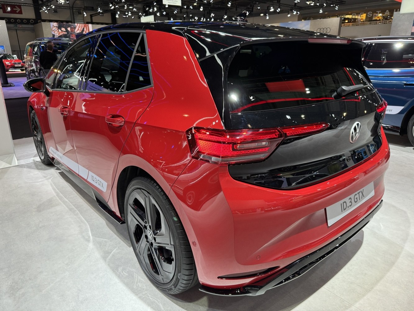 Rear view of modern hatchback with LED tail lights and sporty trim