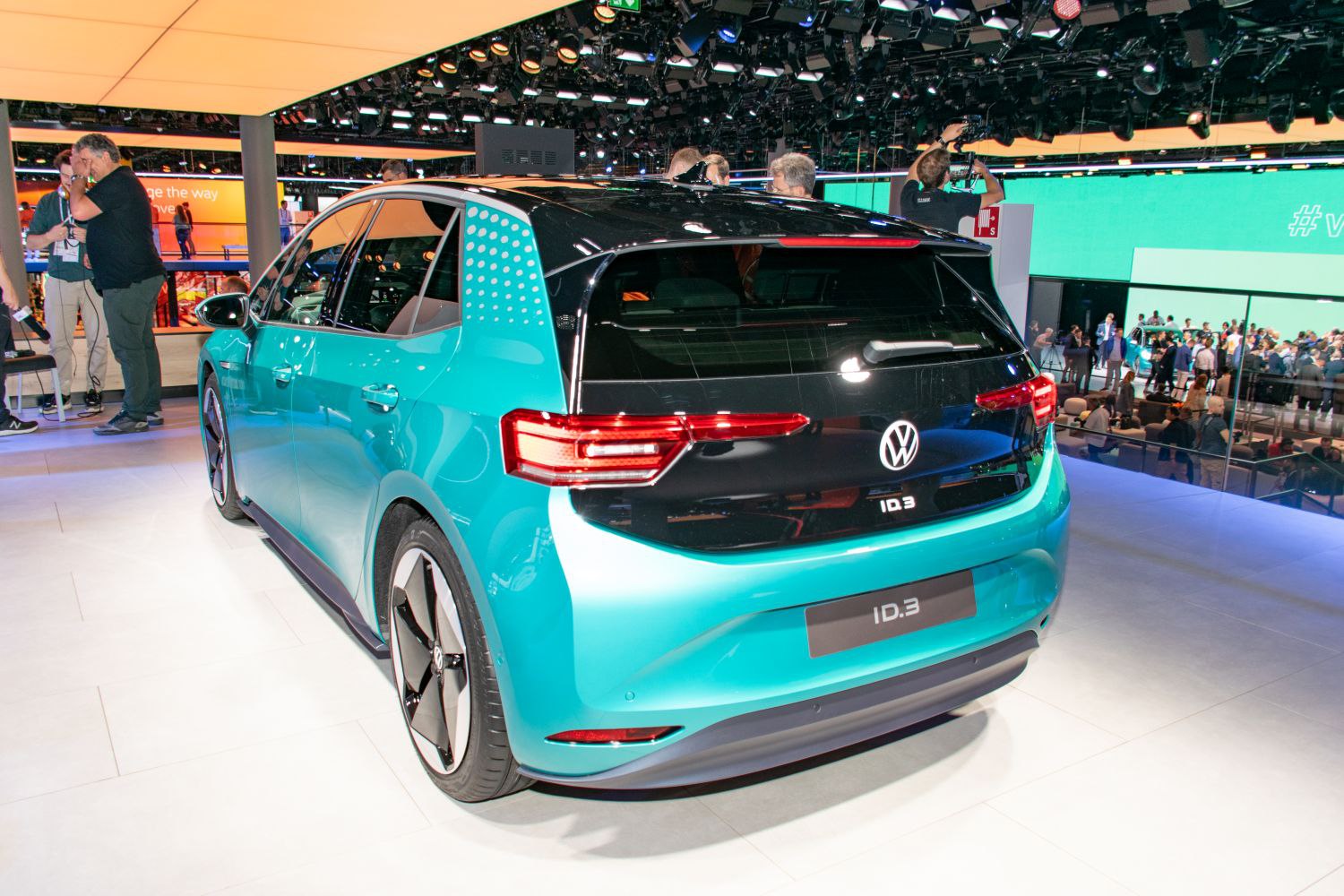 Rear view of electric hatchback with distinct taillights and black roof