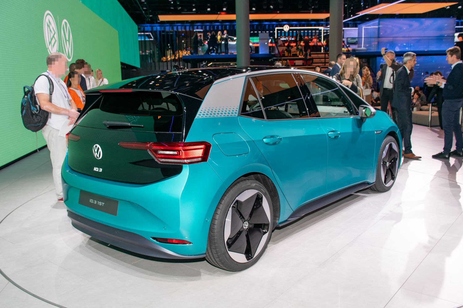 Rear and side view of a modern electric hatchback with distinctive wheels