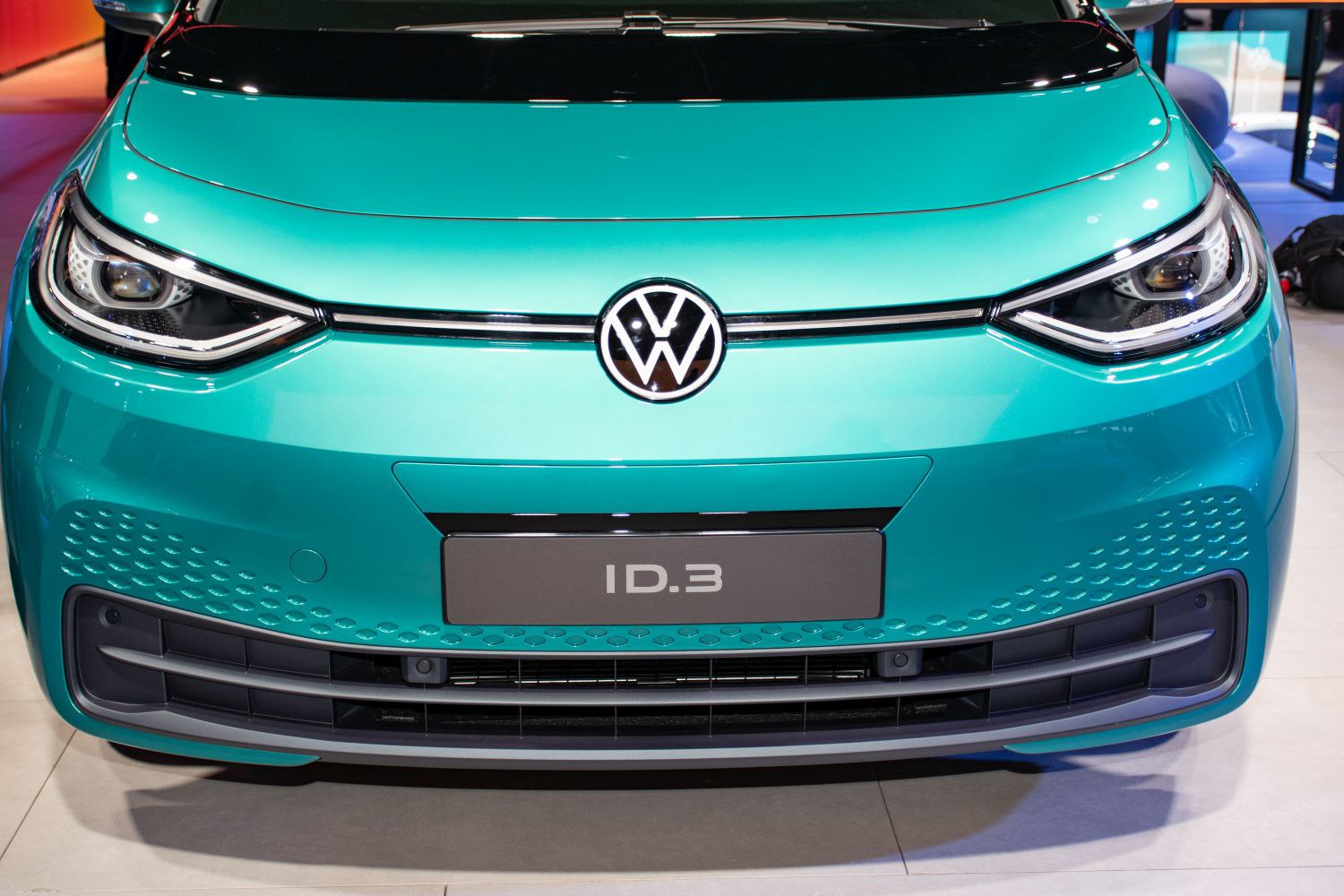 Close-up of front fascia with LED headlights and grille details