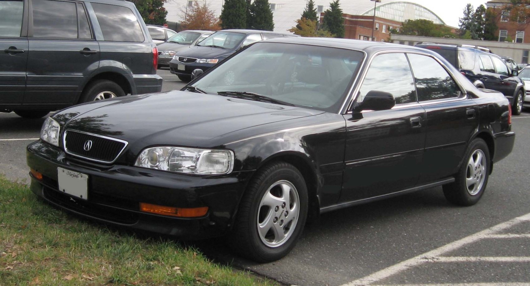 Black sedan with alloy wheels