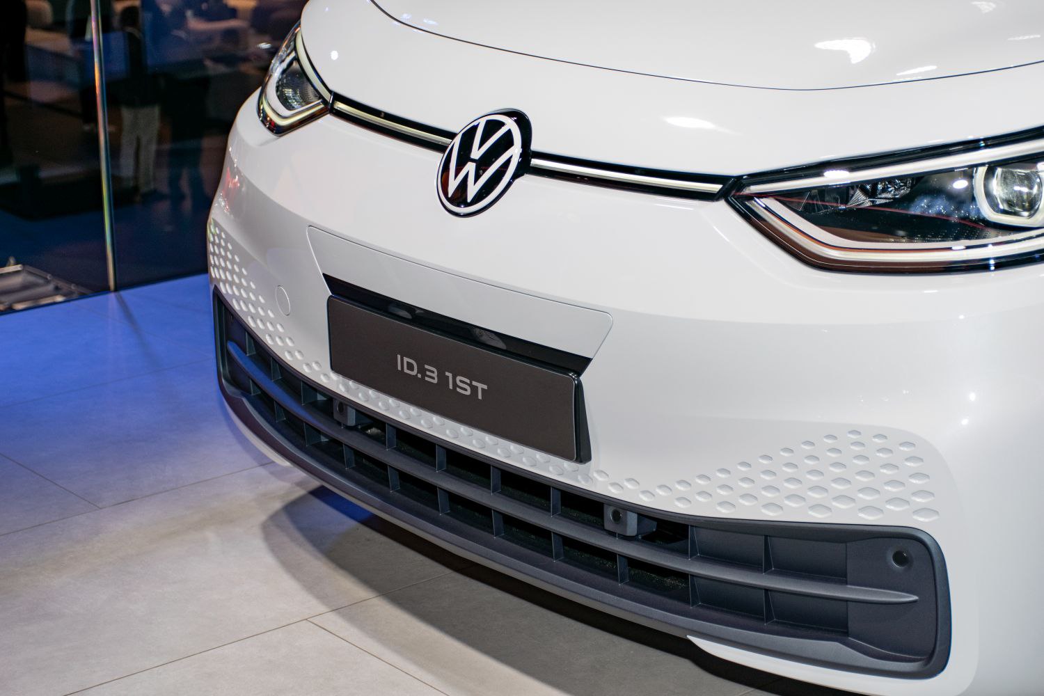 Close-up of front grille and LED headlight