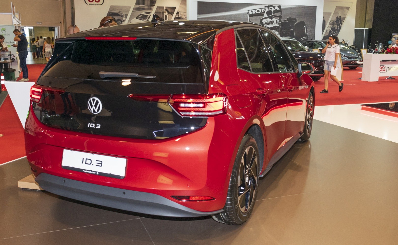 Rear view of an electric hatchback with distinctive taillights and sleek design