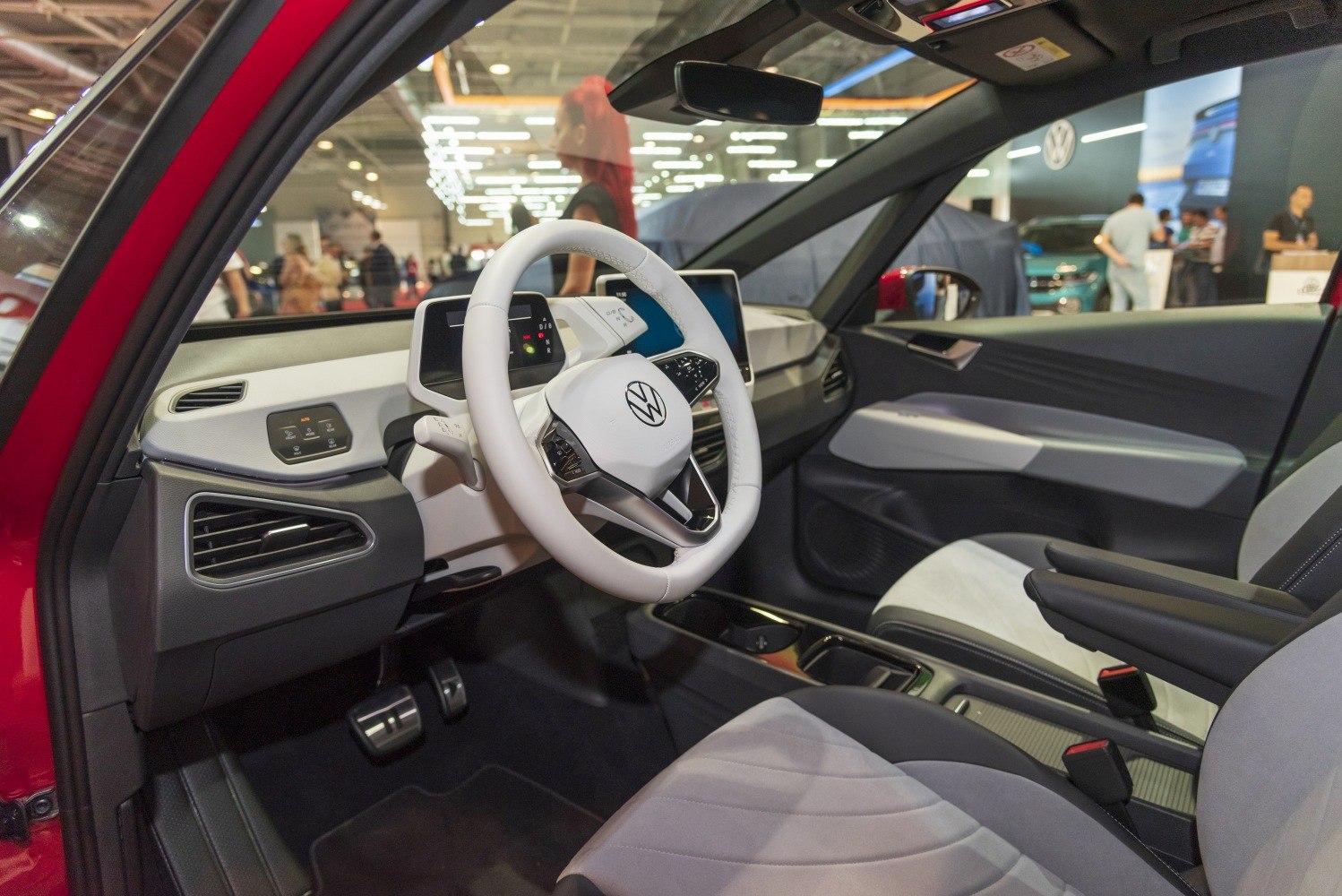 Modern steering wheel and digital dashboard with sleek cabin design