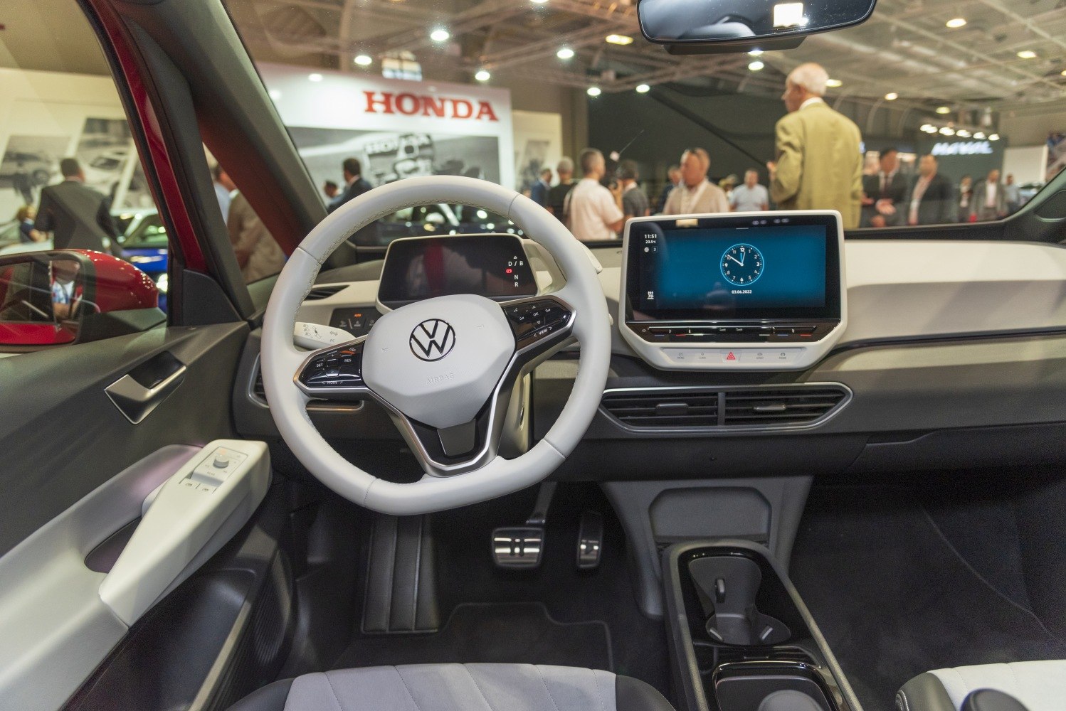 Interior with digital instrument cluster and large touchscreen infotainment.