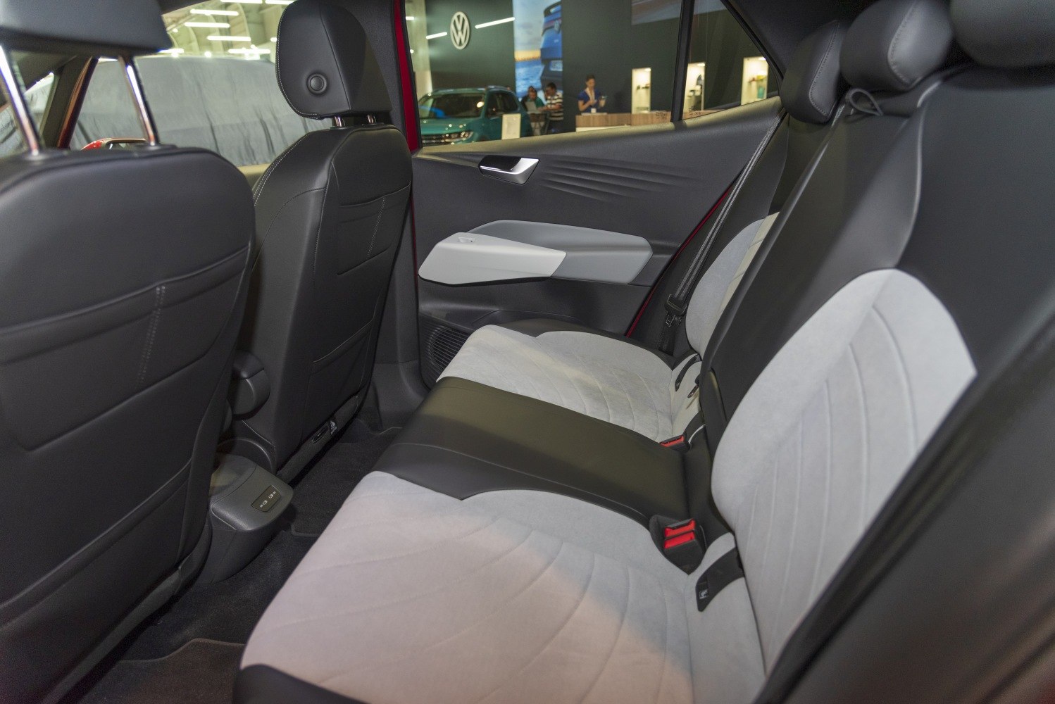 Rear seat interior with two-tone upholstery and ergonomic features