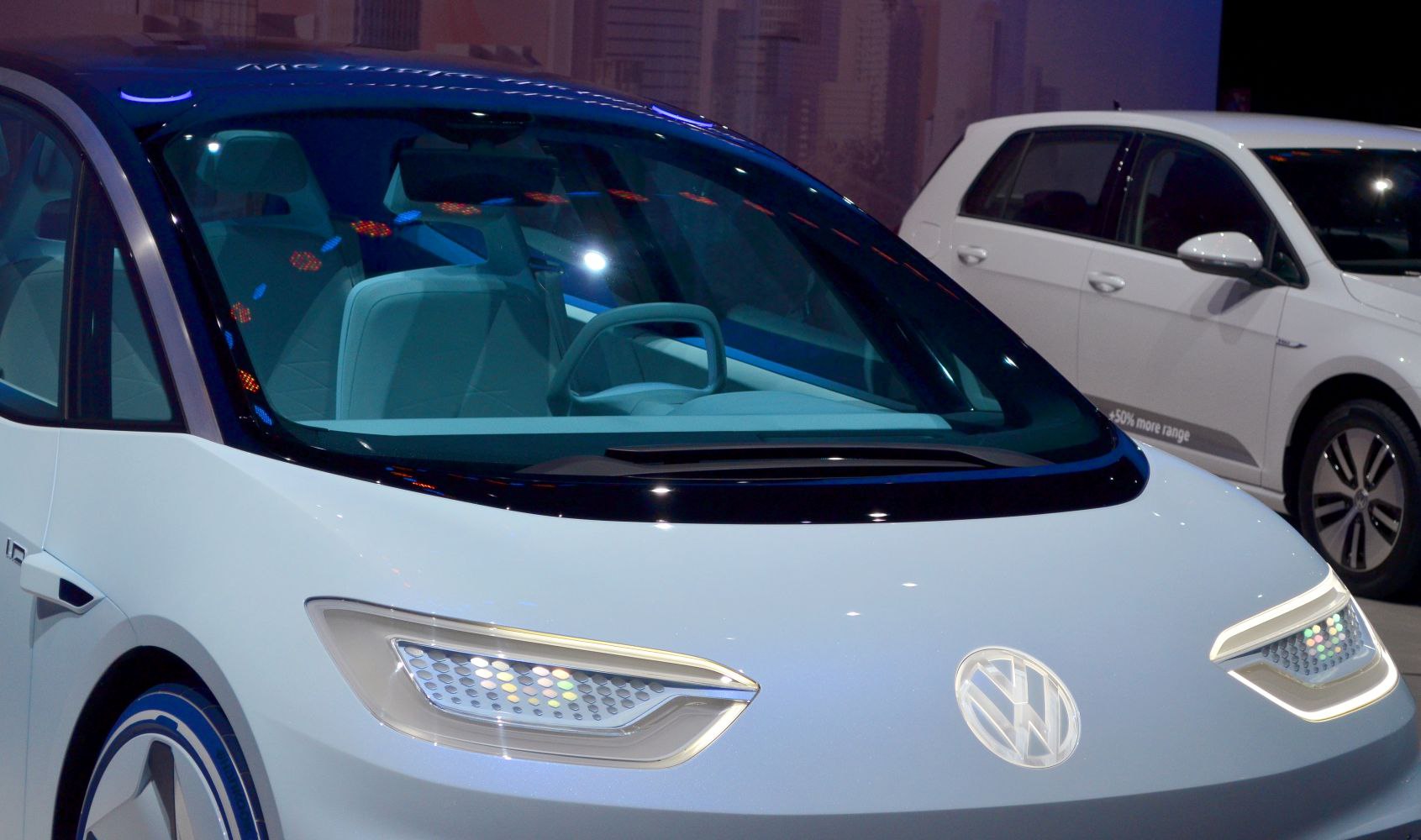 Futuristic front headlights and transparent windshield with modern interior seating