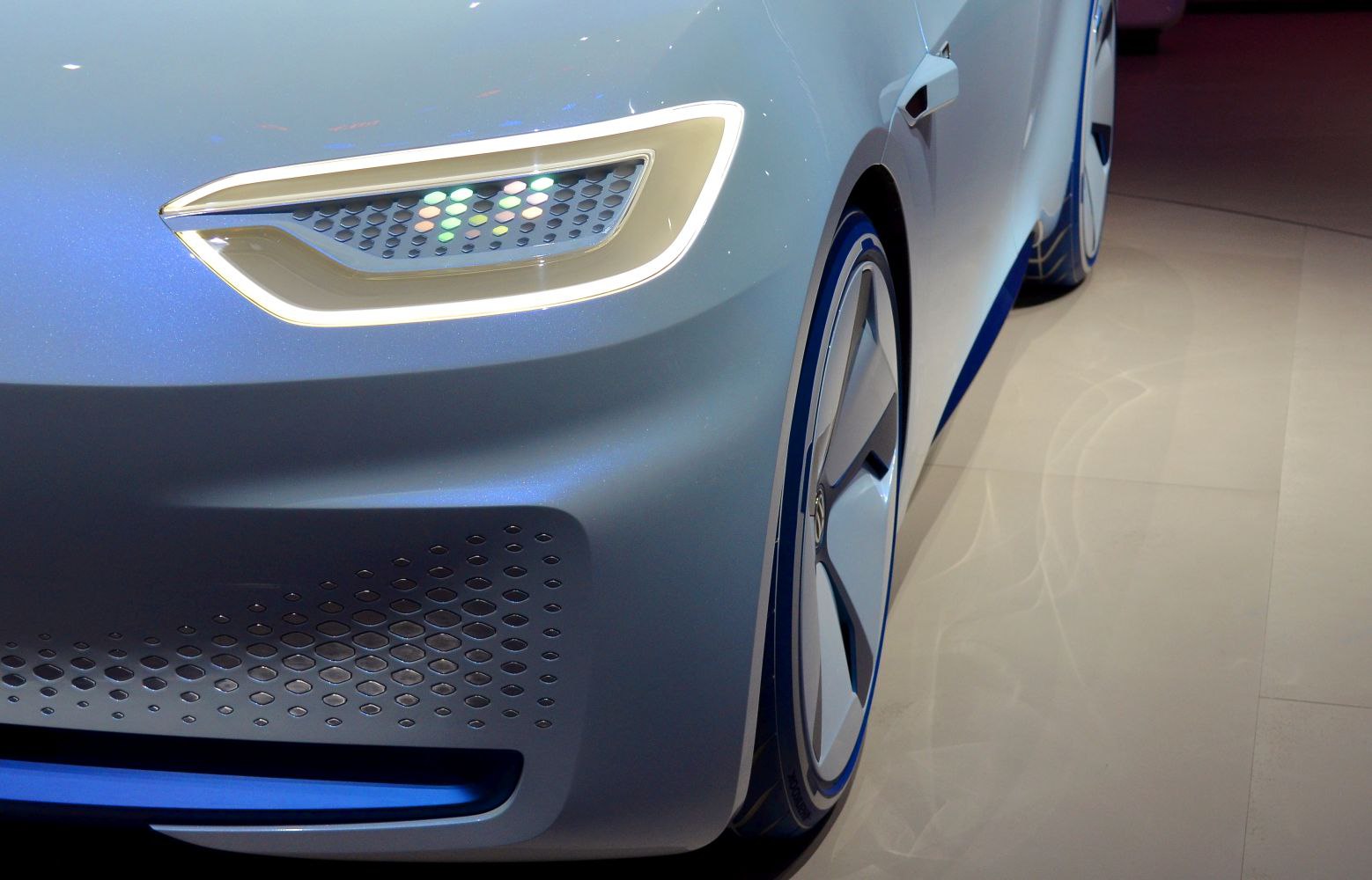 Futuristic headlight and aerodynamic wheel design