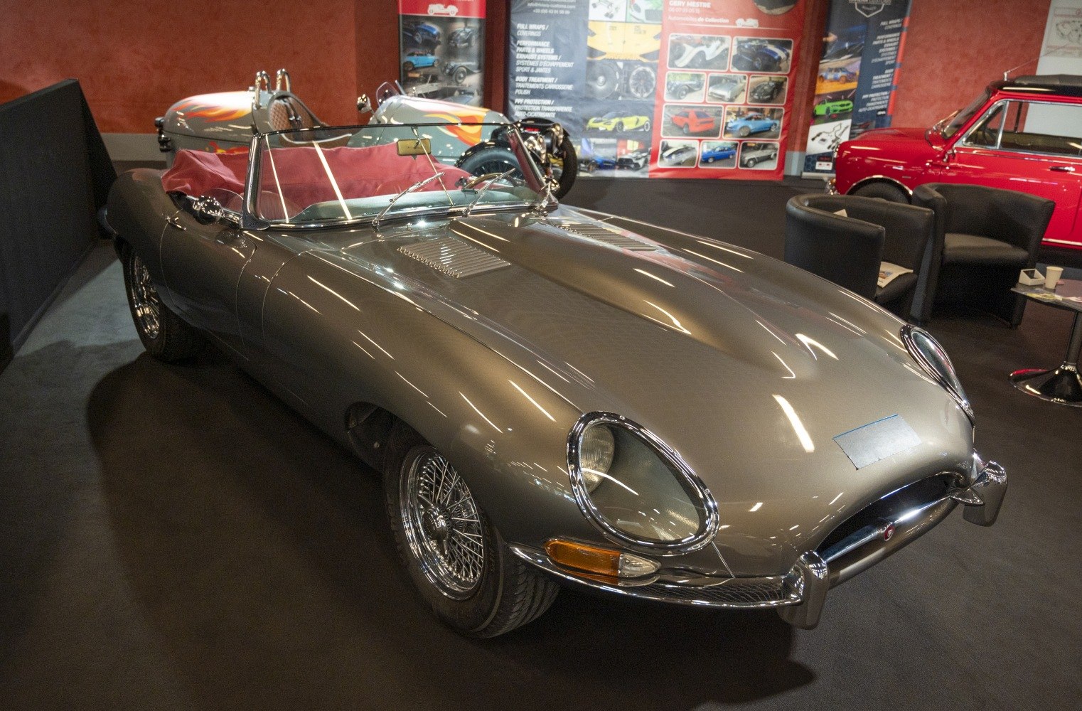 Sleek convertible with wire wheels and classic 60s sports car styling