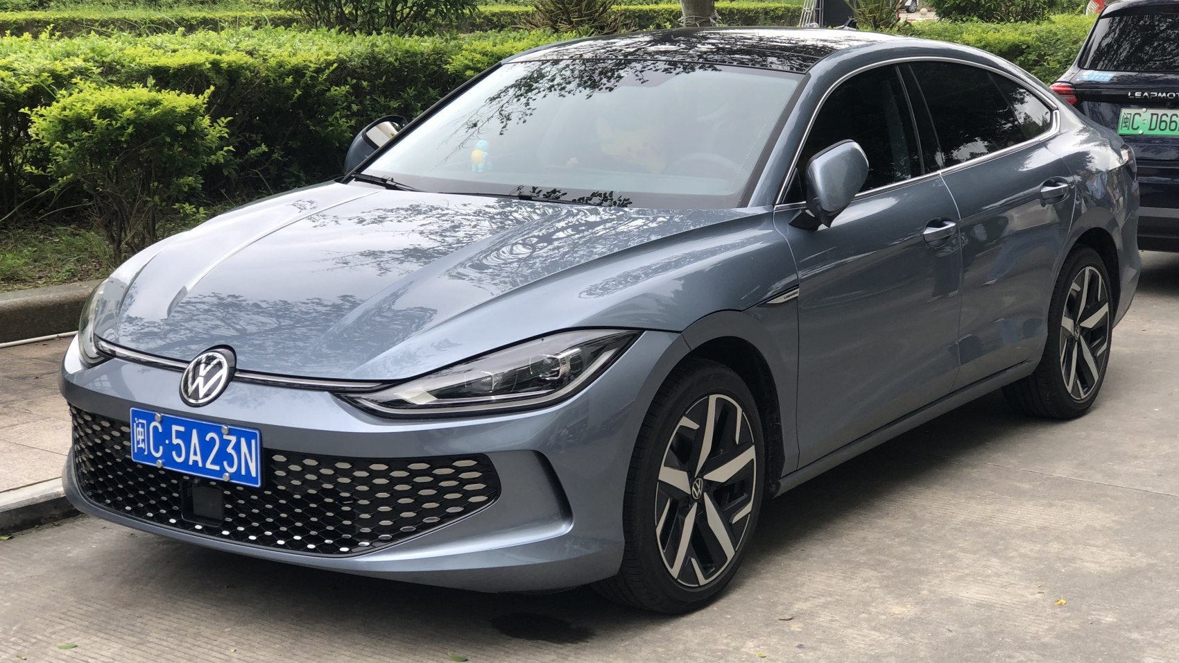 Modern front design with sharp headlights and alloy wheels