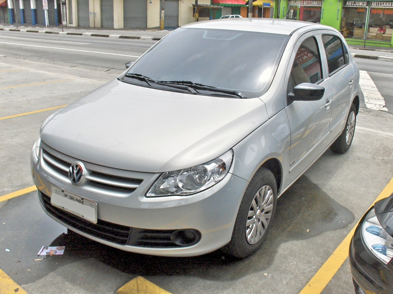 Silver hatchback with front grille and headlights