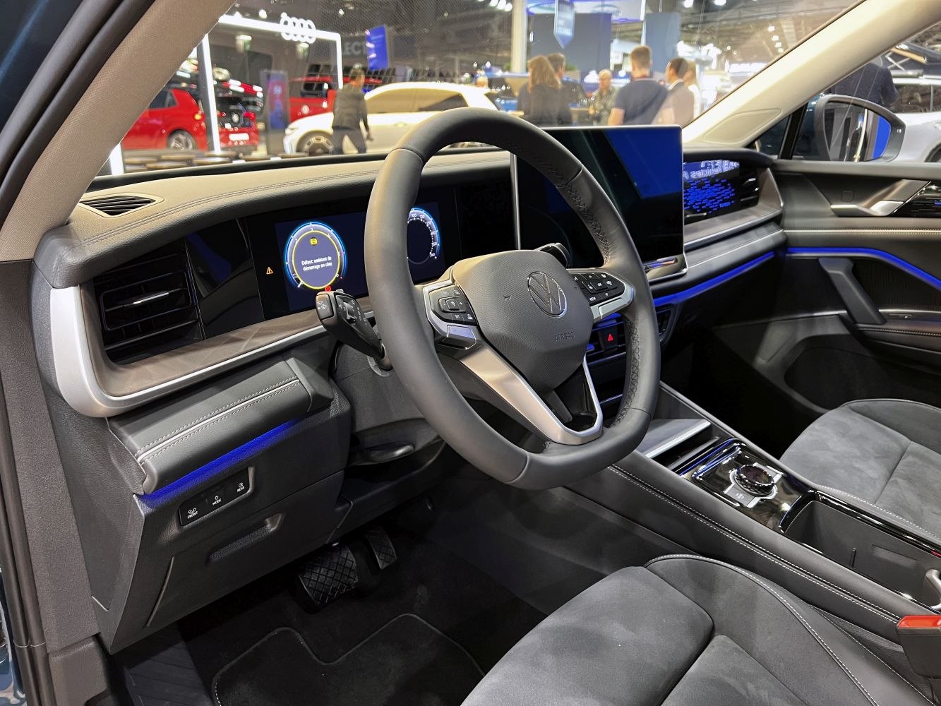 Digital dashboard and steering wheel with modern design and ambient lighting