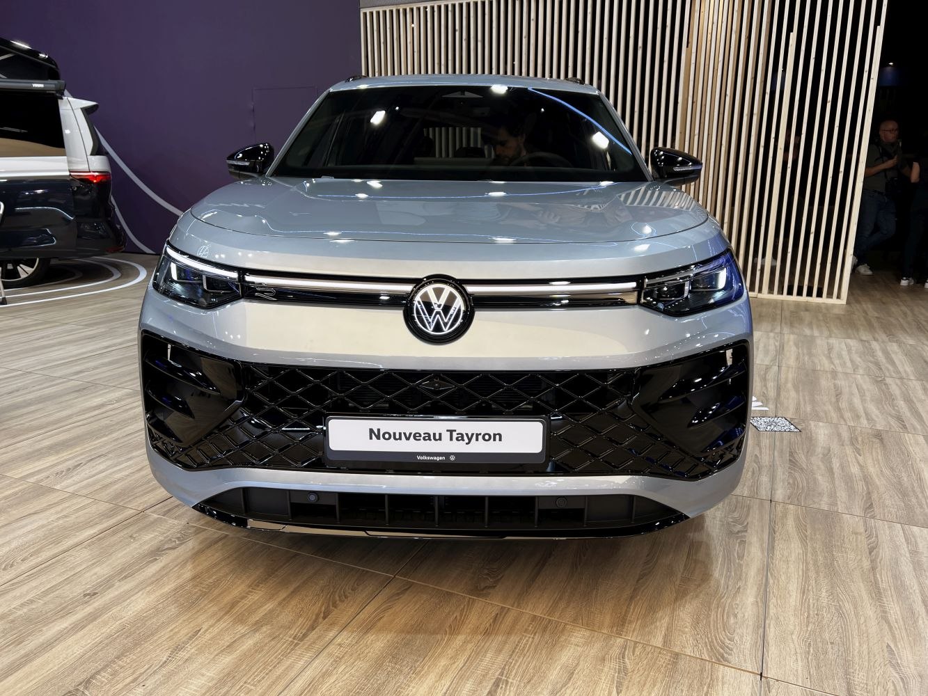 Front view with LED headlights and bold grille