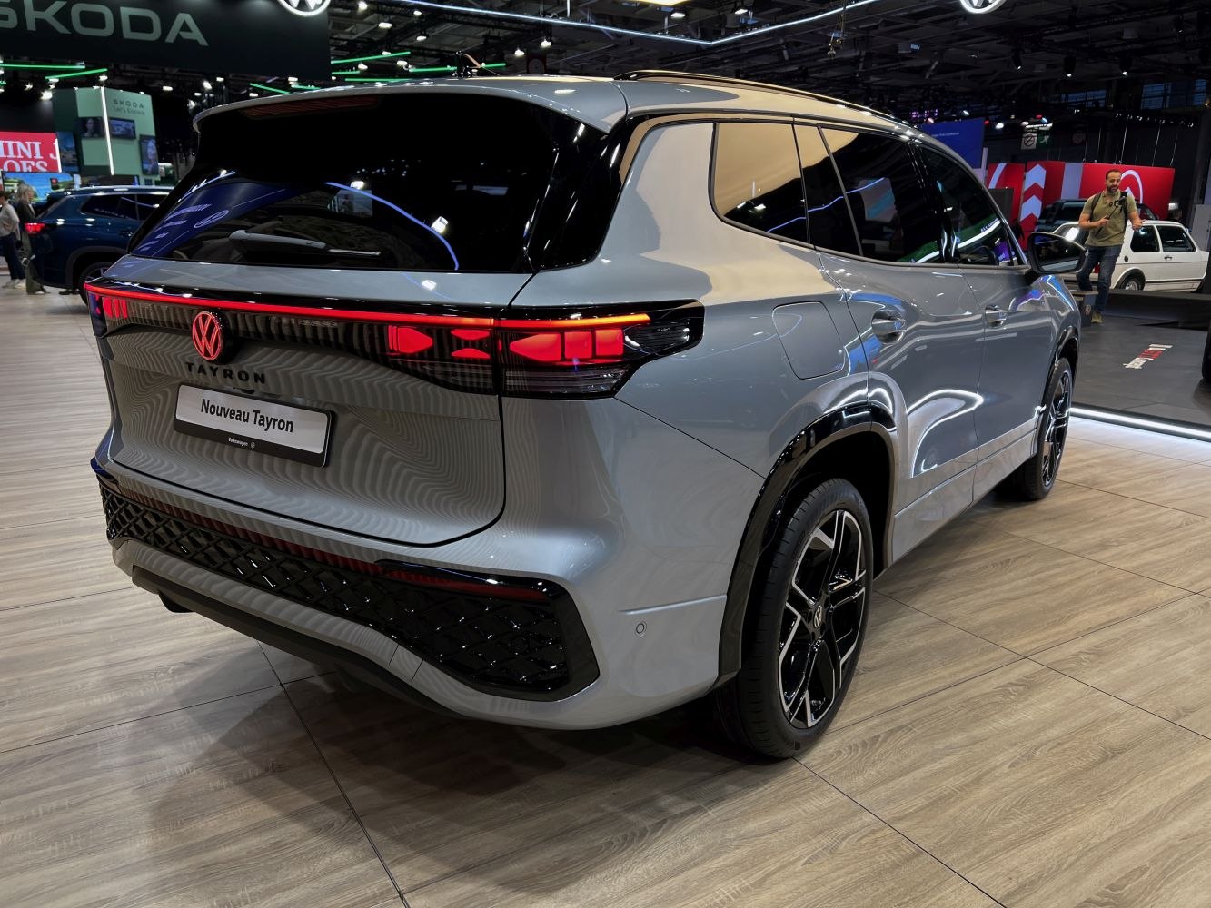 Modern SUV rear design with sleek illuminated taillights and black trim details