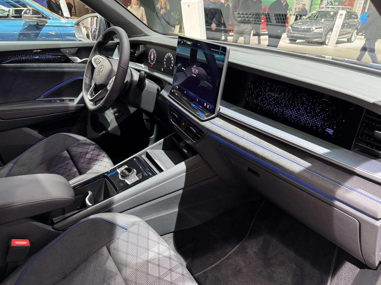 Digital dashboard and large touchscreen center display inside car interior
