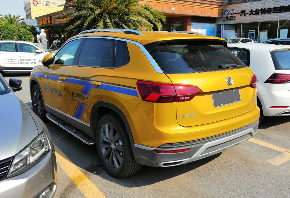 Rear and side profile of an SUV with distinctive tail lights and sporty design