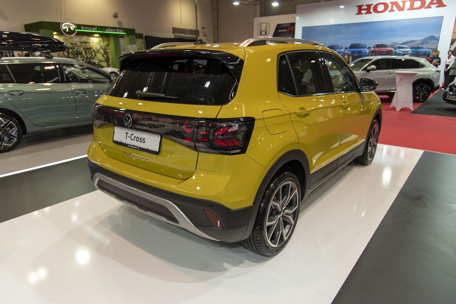 Rear view with distinctive taillights and black trim on facelift SUV