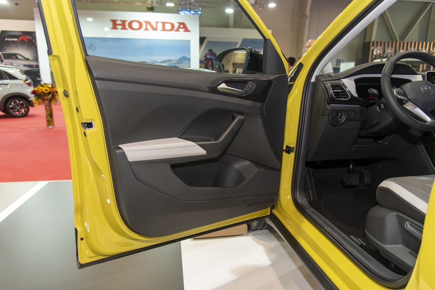 Modern interior door panel and dashboard layout with controls