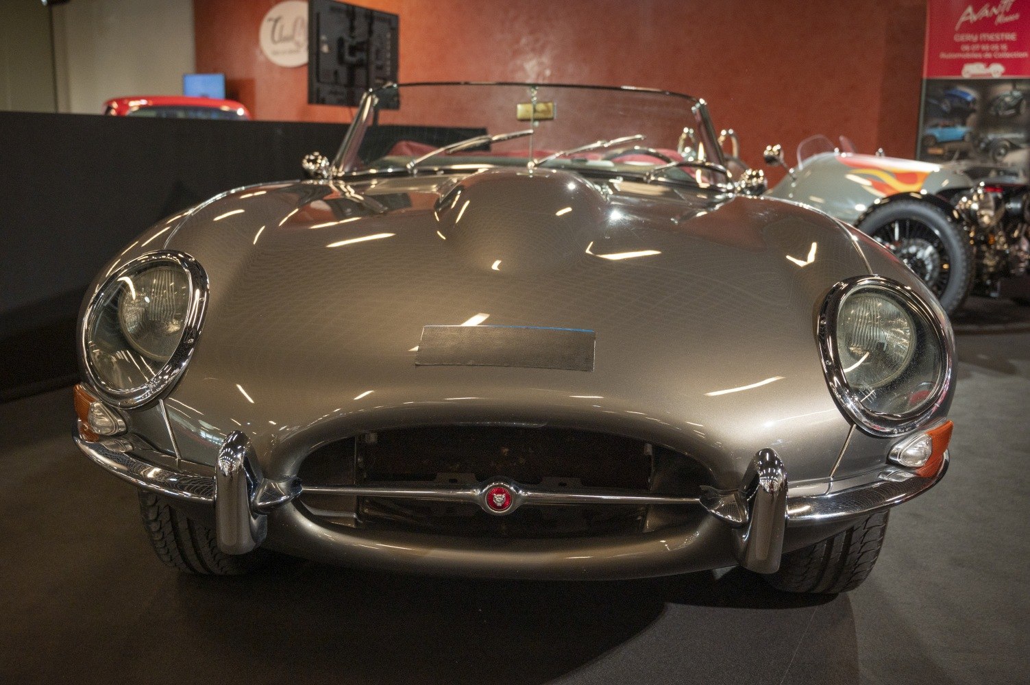 Front view showcasing round headlights and chrome bumper
