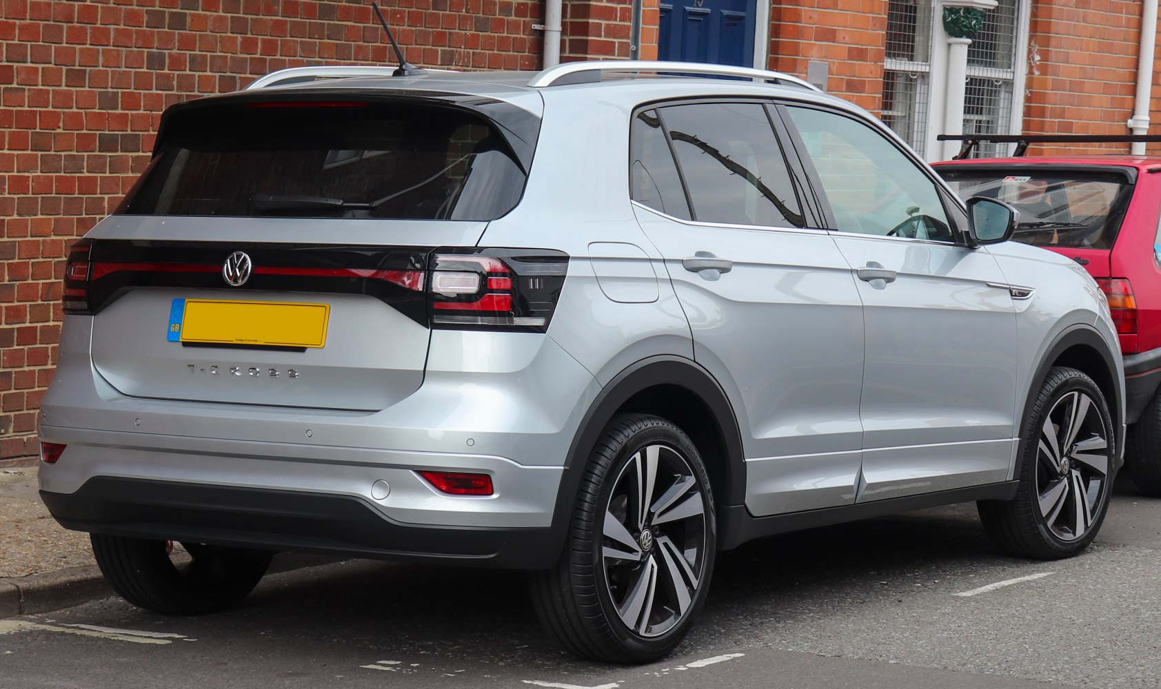Rear view of compact SUV with LED tail lights and alloy wheels