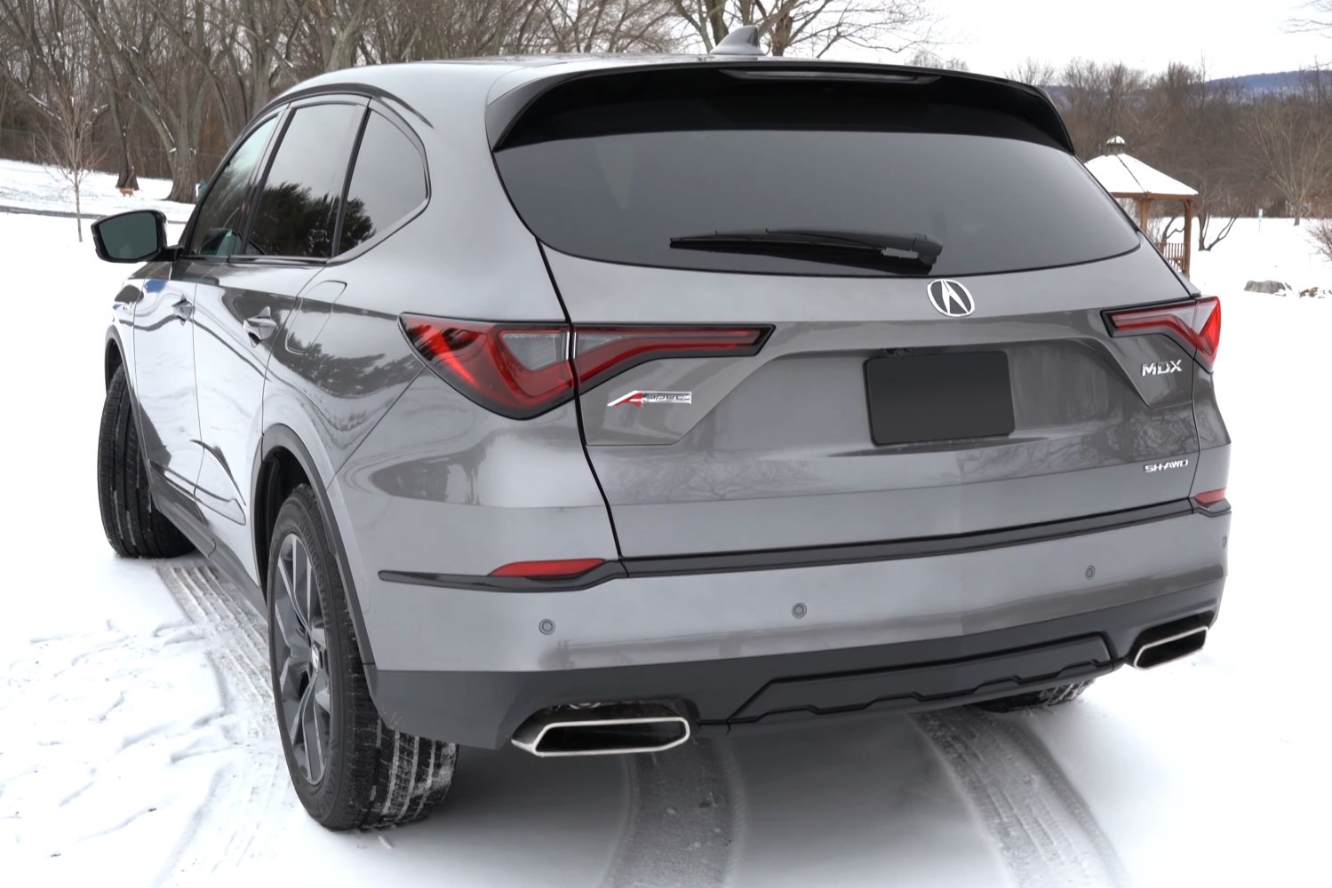 Rear view of SUV with dual exhausts and AWD badge