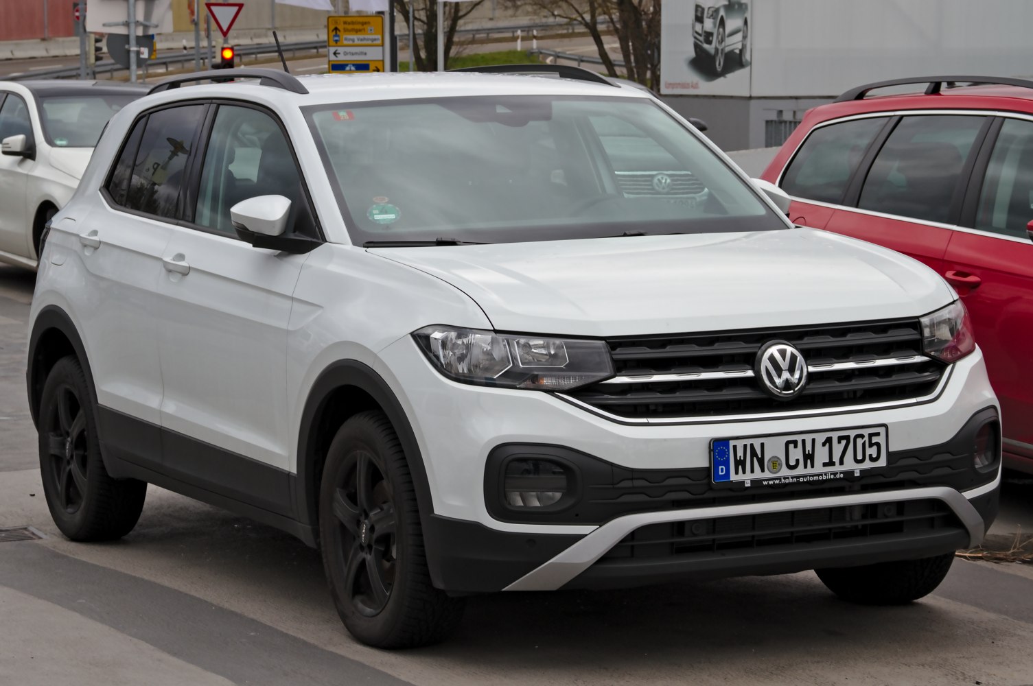 Compact SUV front and side view with grille and black wheels