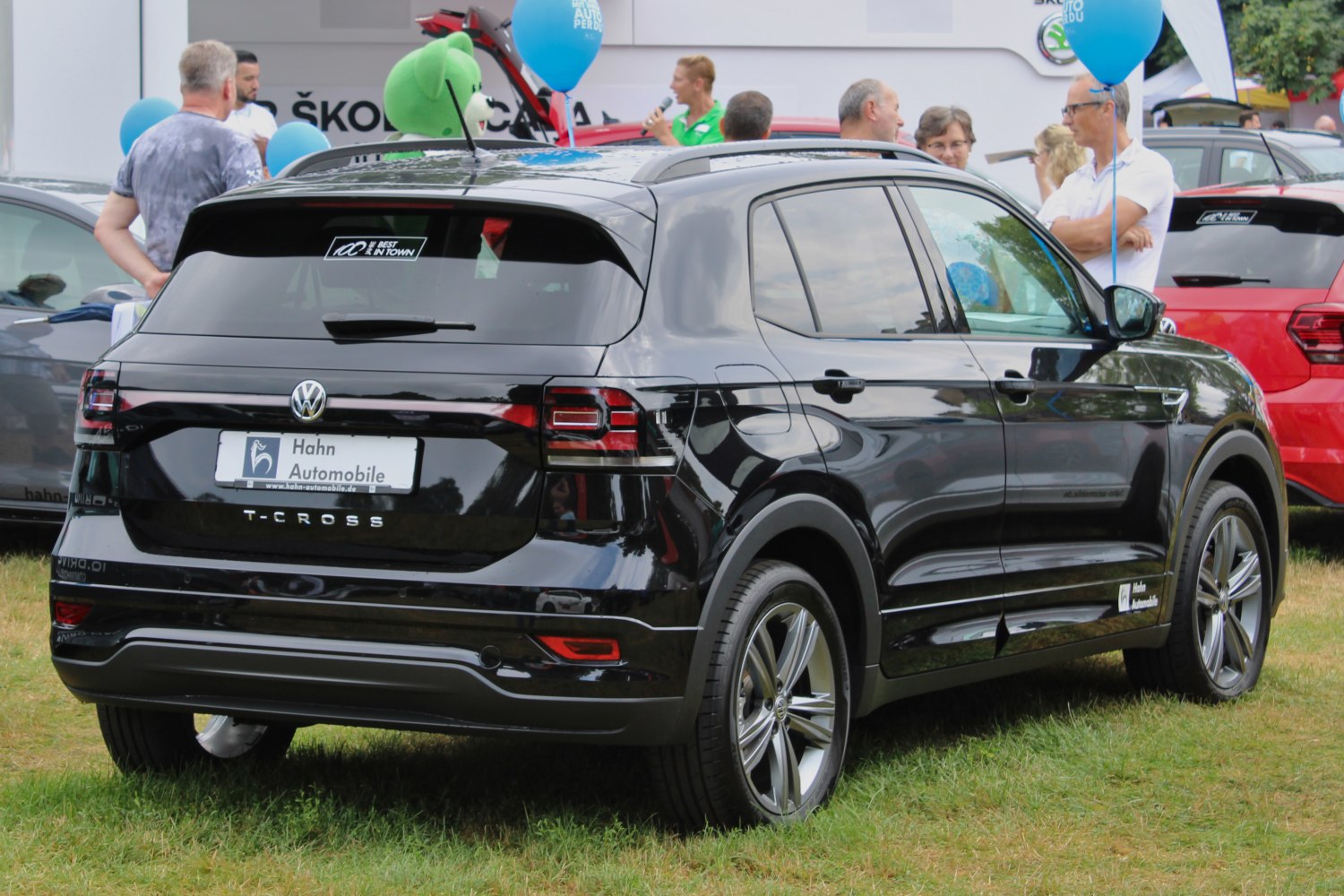 Black compact SUV rear side with modern tail lights and alloy wheels