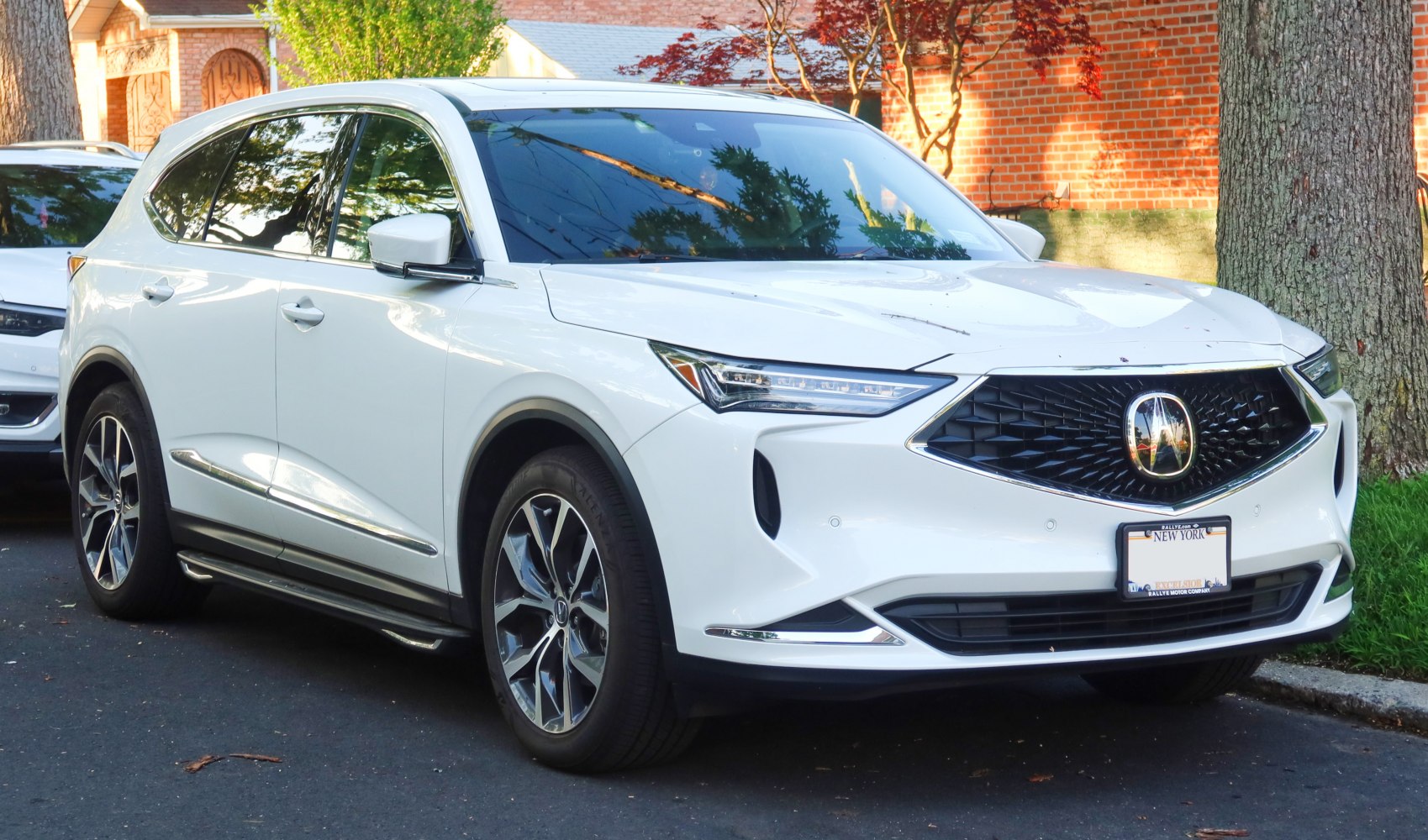Front angle with LED headlights and signature grille