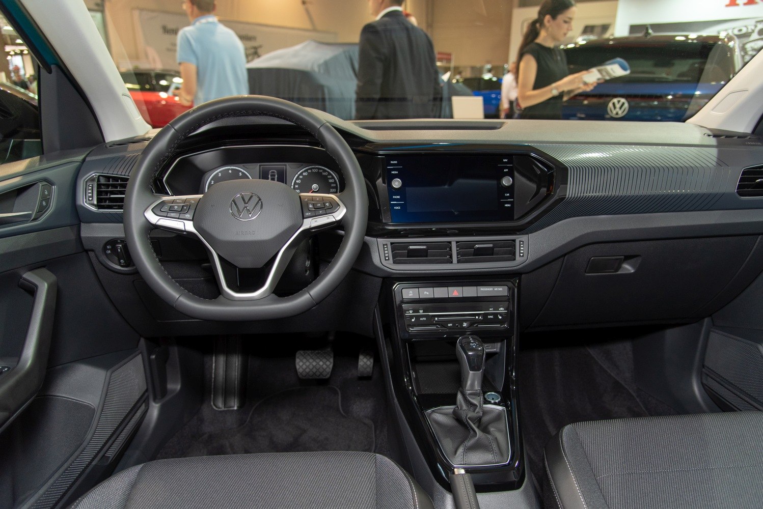 Modern steering wheel and digital dashboard with touchscreen console
