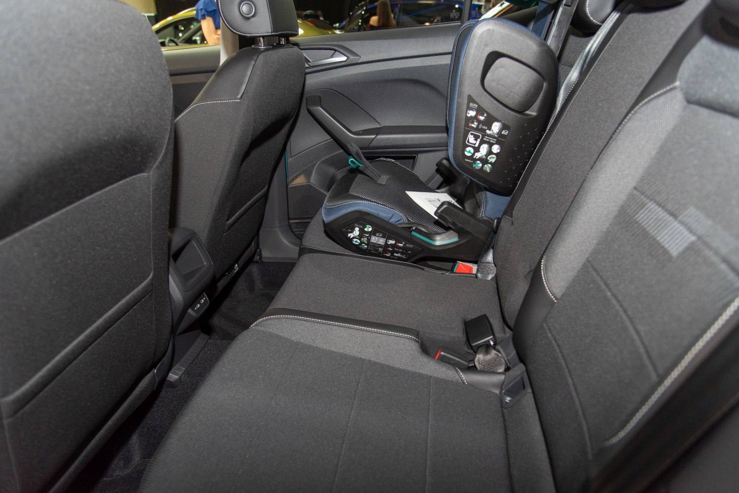 Rear seats with child safety seat installation in compact SUV interior