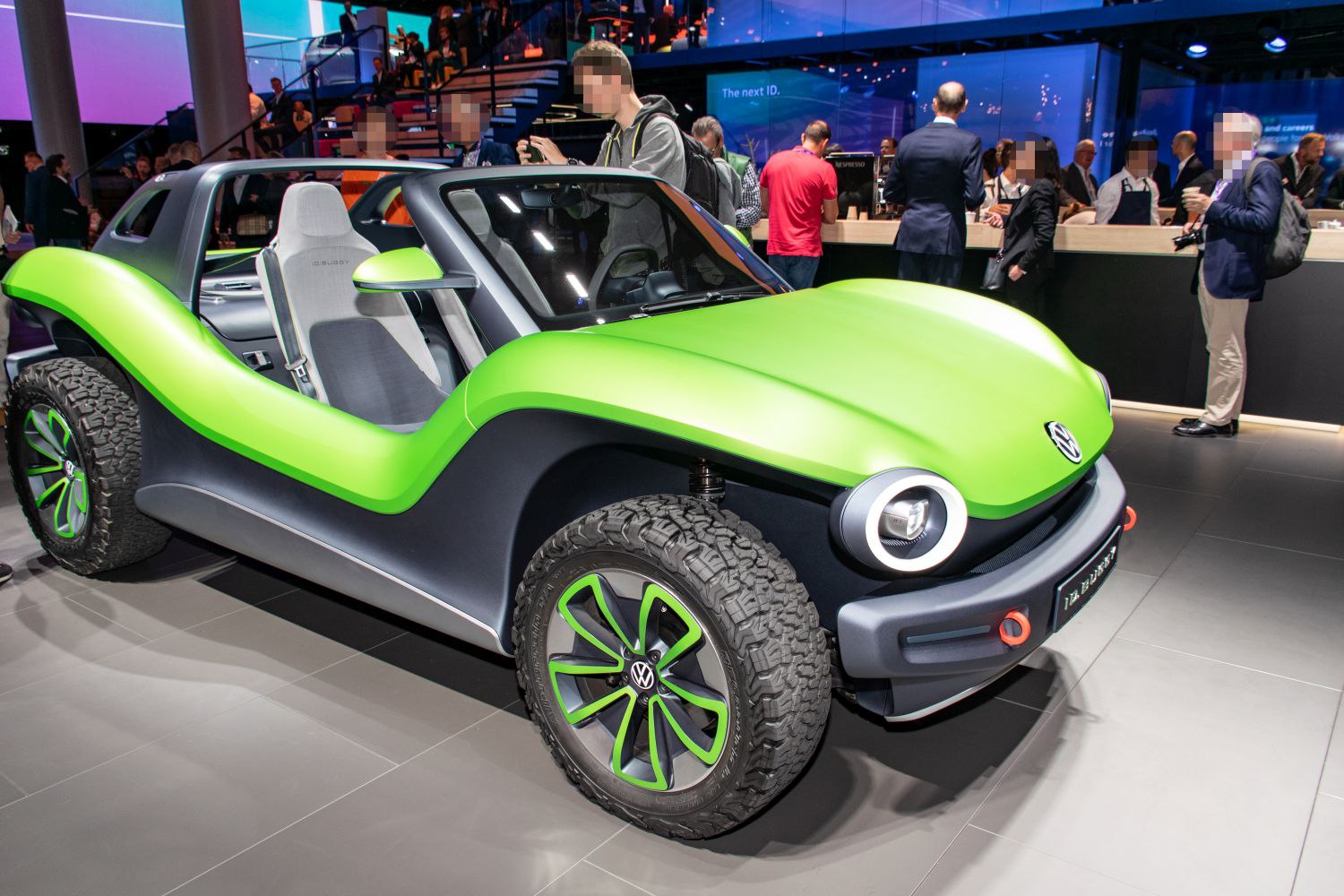 Open-body electric buggy with rugged off-road tires and modern design