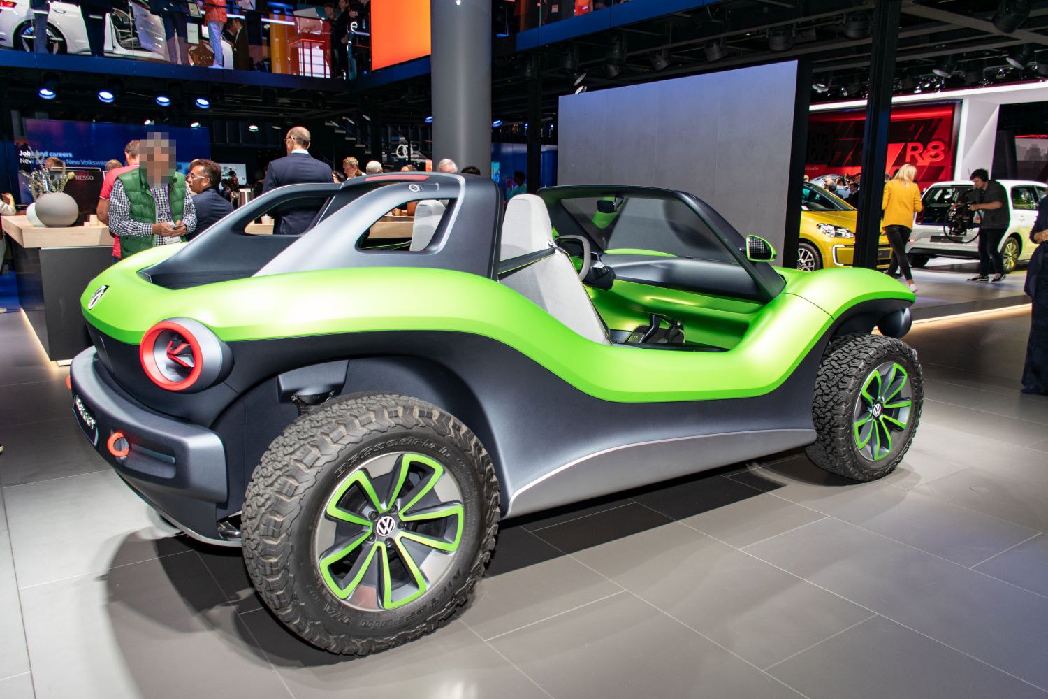 Open-top electric buggy with rugged off-road tires and modern design