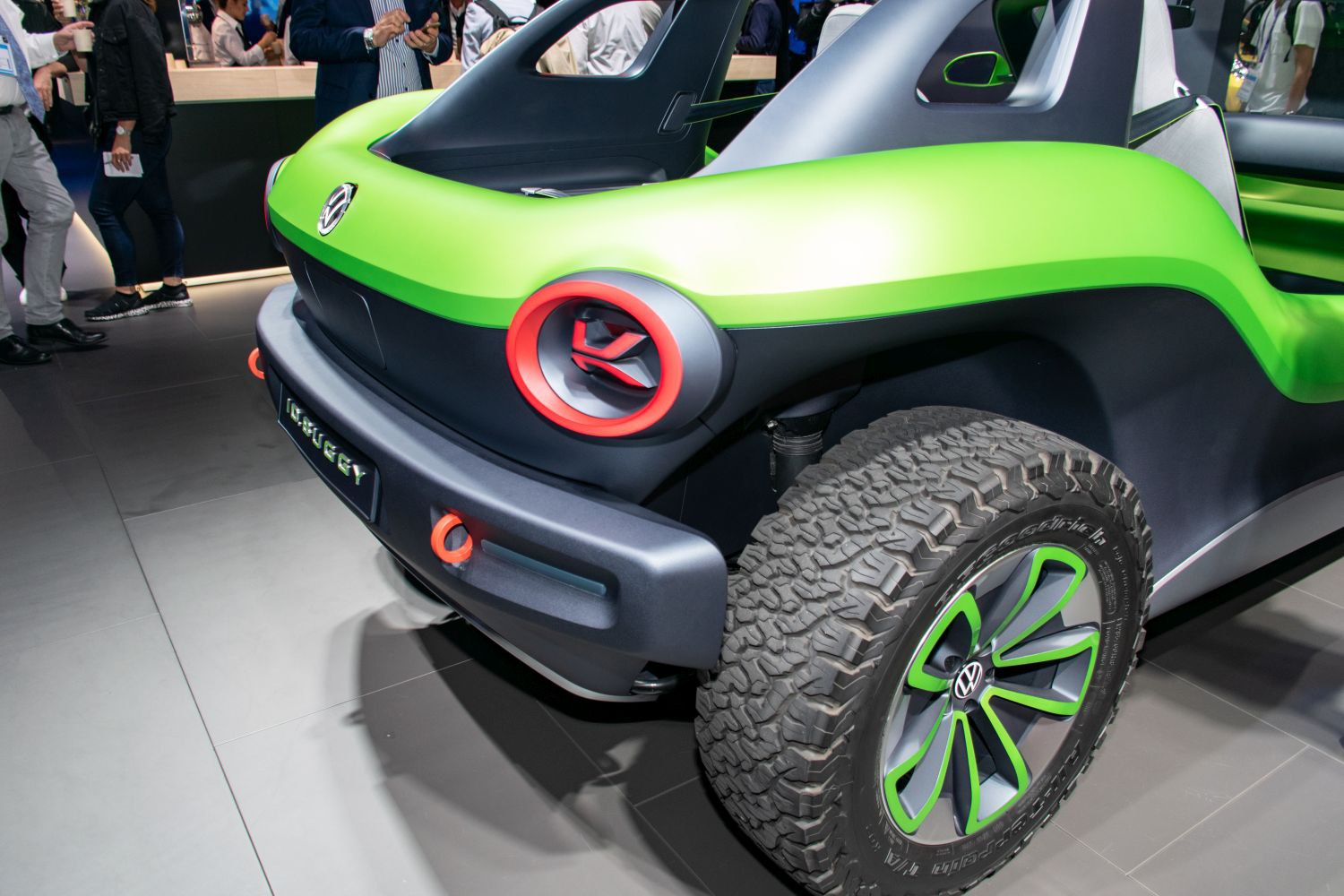 Rear design with distinctive round taillights and rugged off-road tires