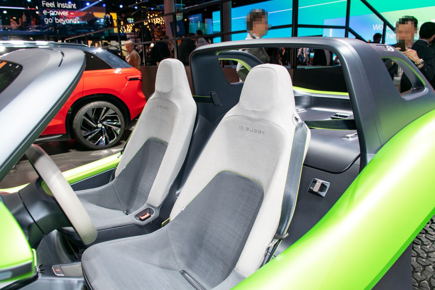 Bucket-style seats with minimalistic, modern open-top interior