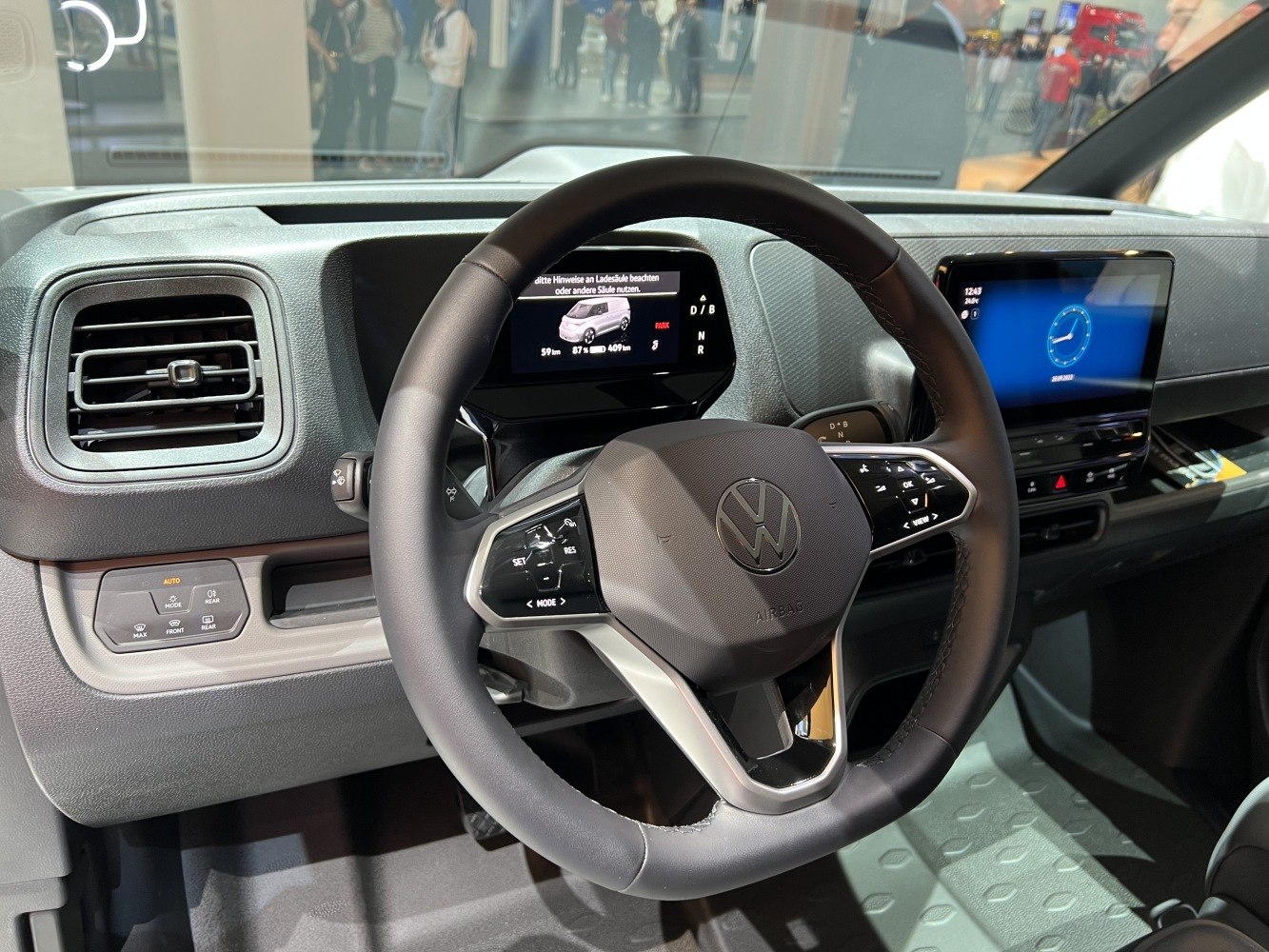 Multifunction steering wheel and digital dashboard displays