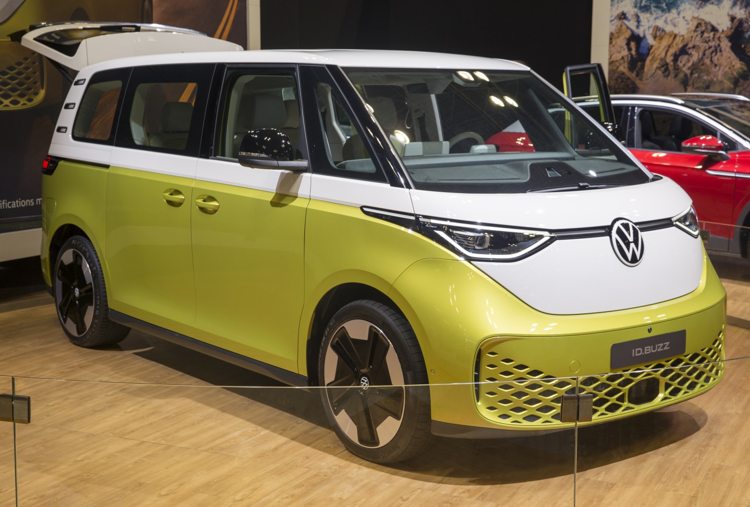 Front side view of a modern electric van in two-tone paint