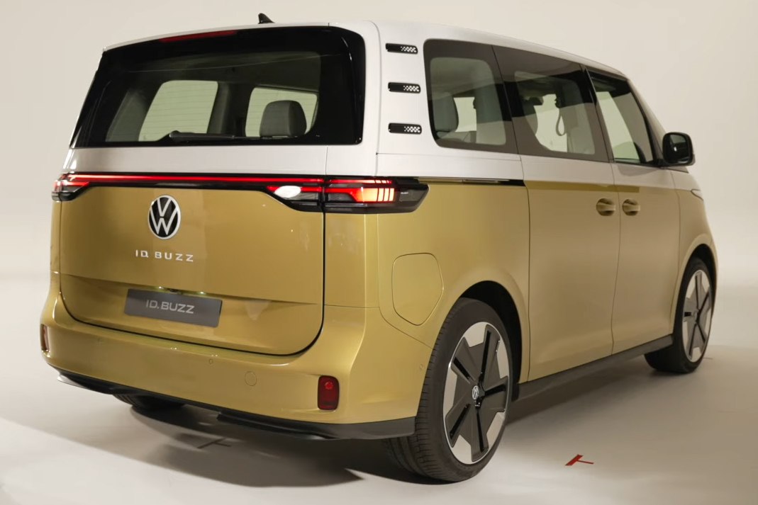 Rear and side profile of a modern electric van with sliding door and aerodynamic wheels