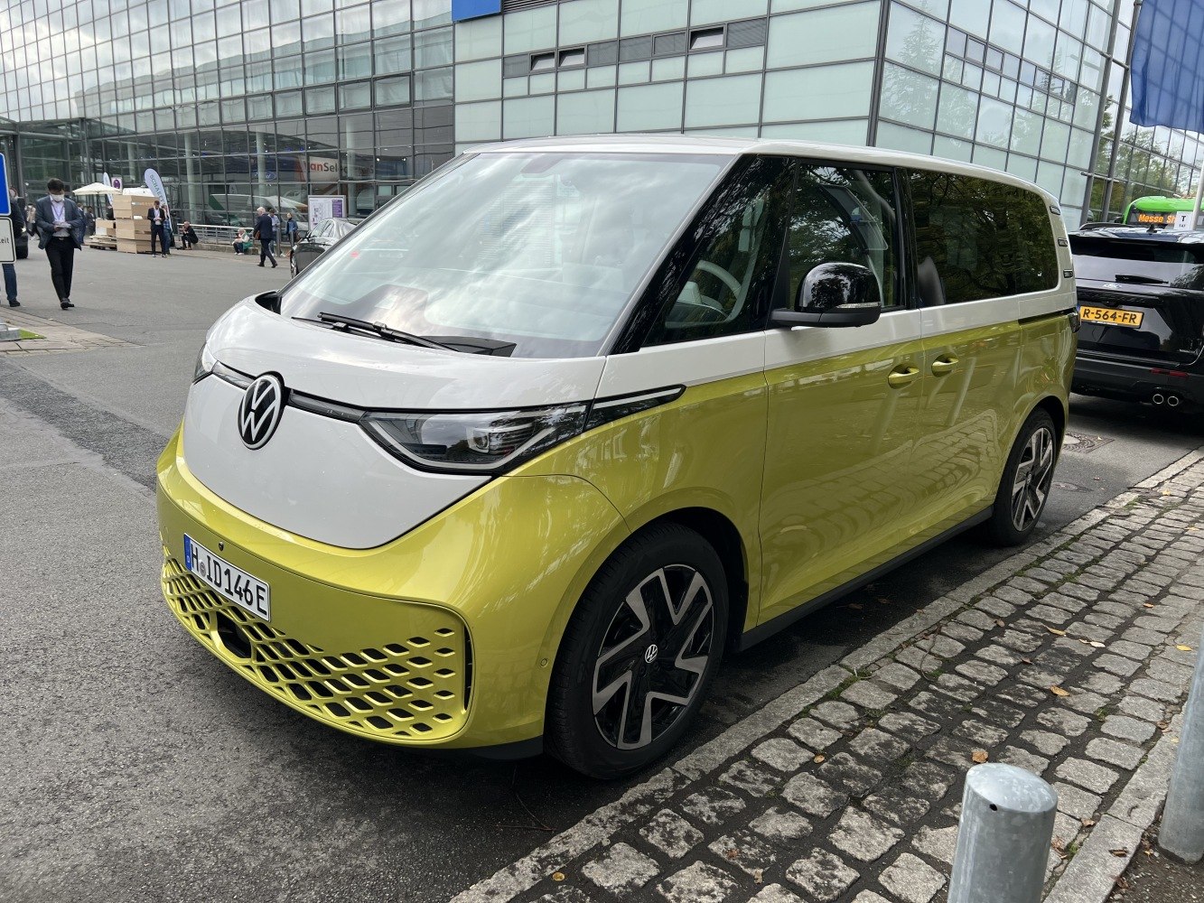 Front and side view with modern headlights and unique grille design