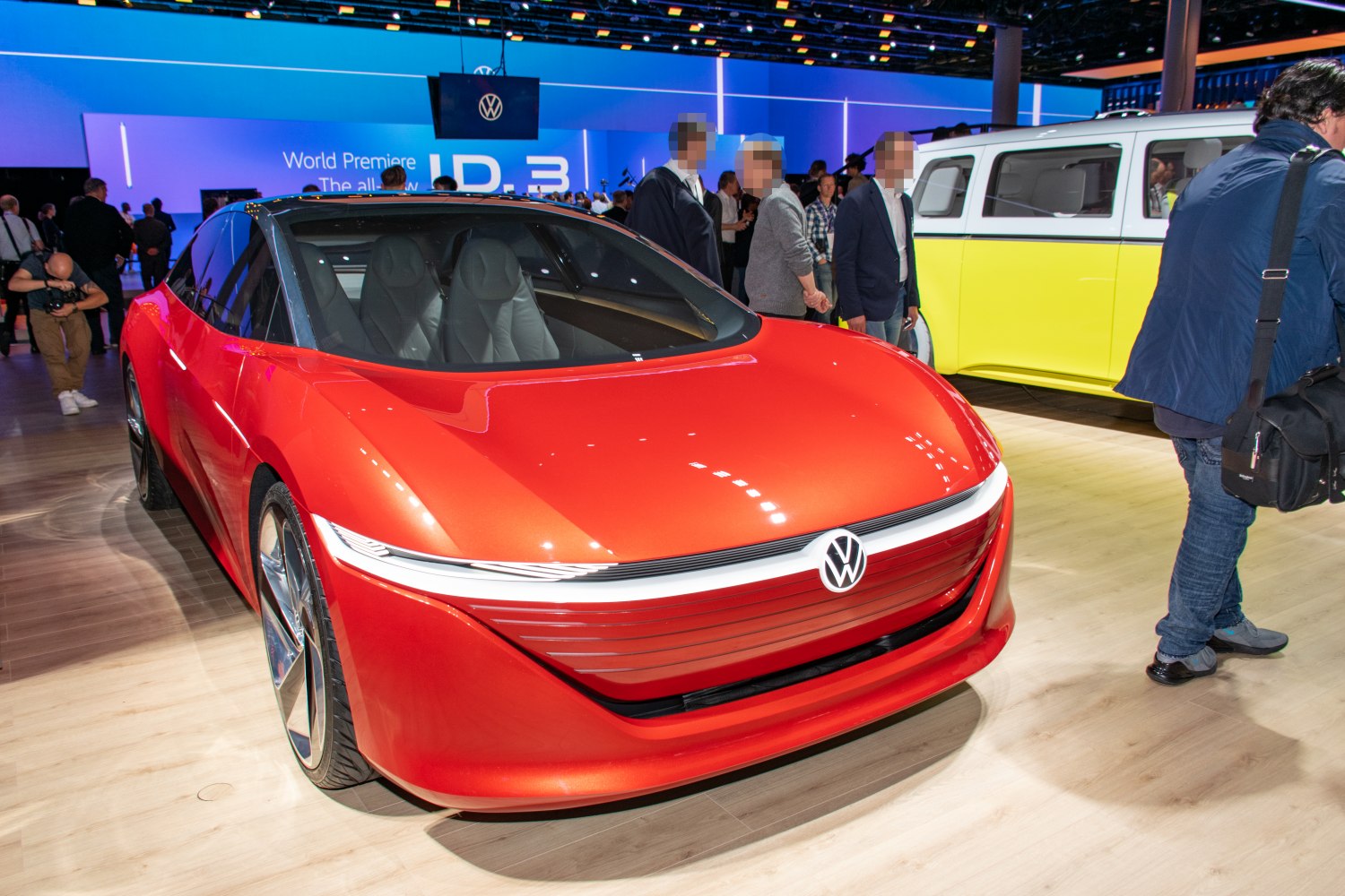 Futuristic electric sedan with aerodynamic body and LED light bar