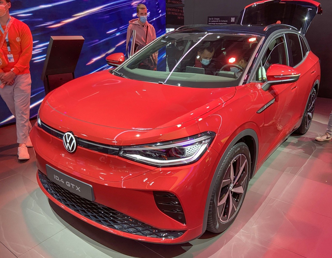 Red electric SUV with LED headlights and sporty front fascia