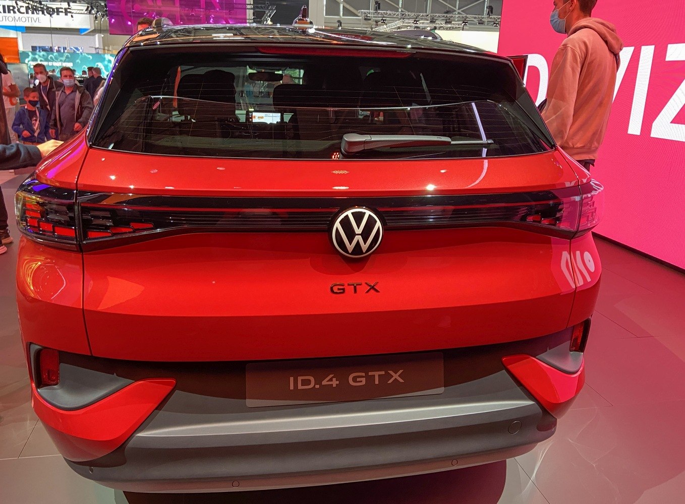 Rear view of an electric SUV with LED tail lights and rear windshield wiper