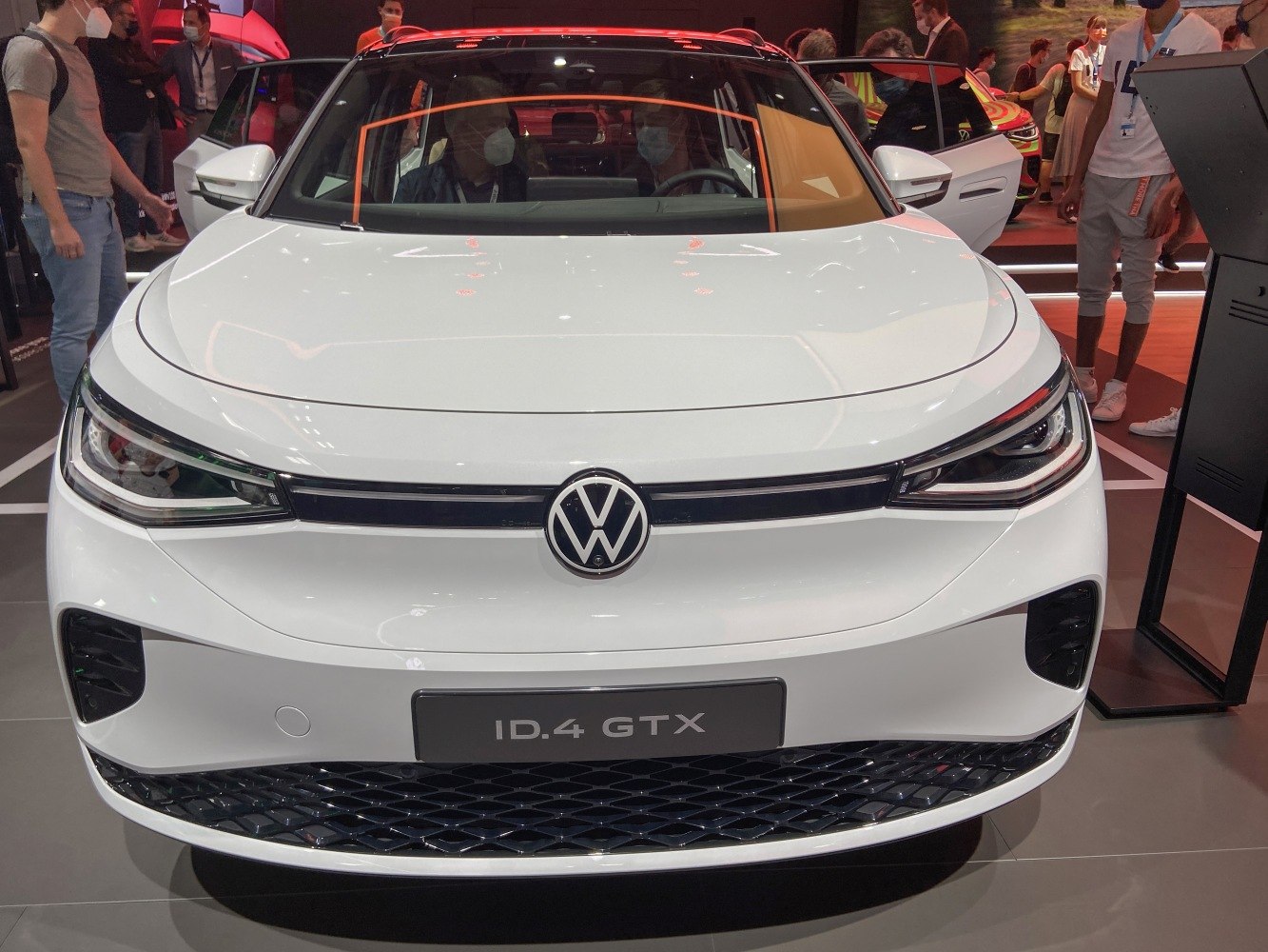 Front view of electric SUV with LED headlights and VW emblem