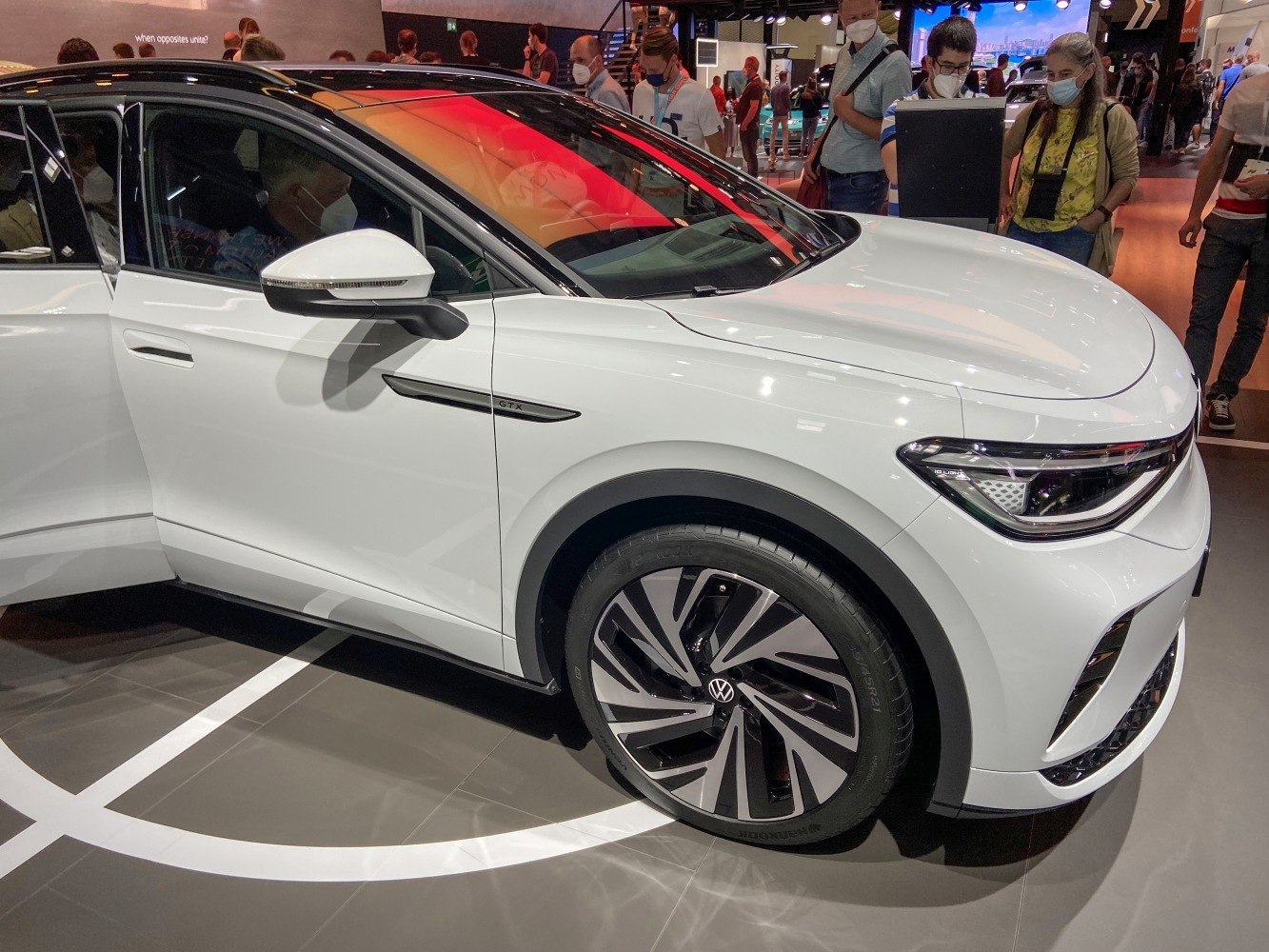 Sleek front side view with LED headlights and alloy wheels