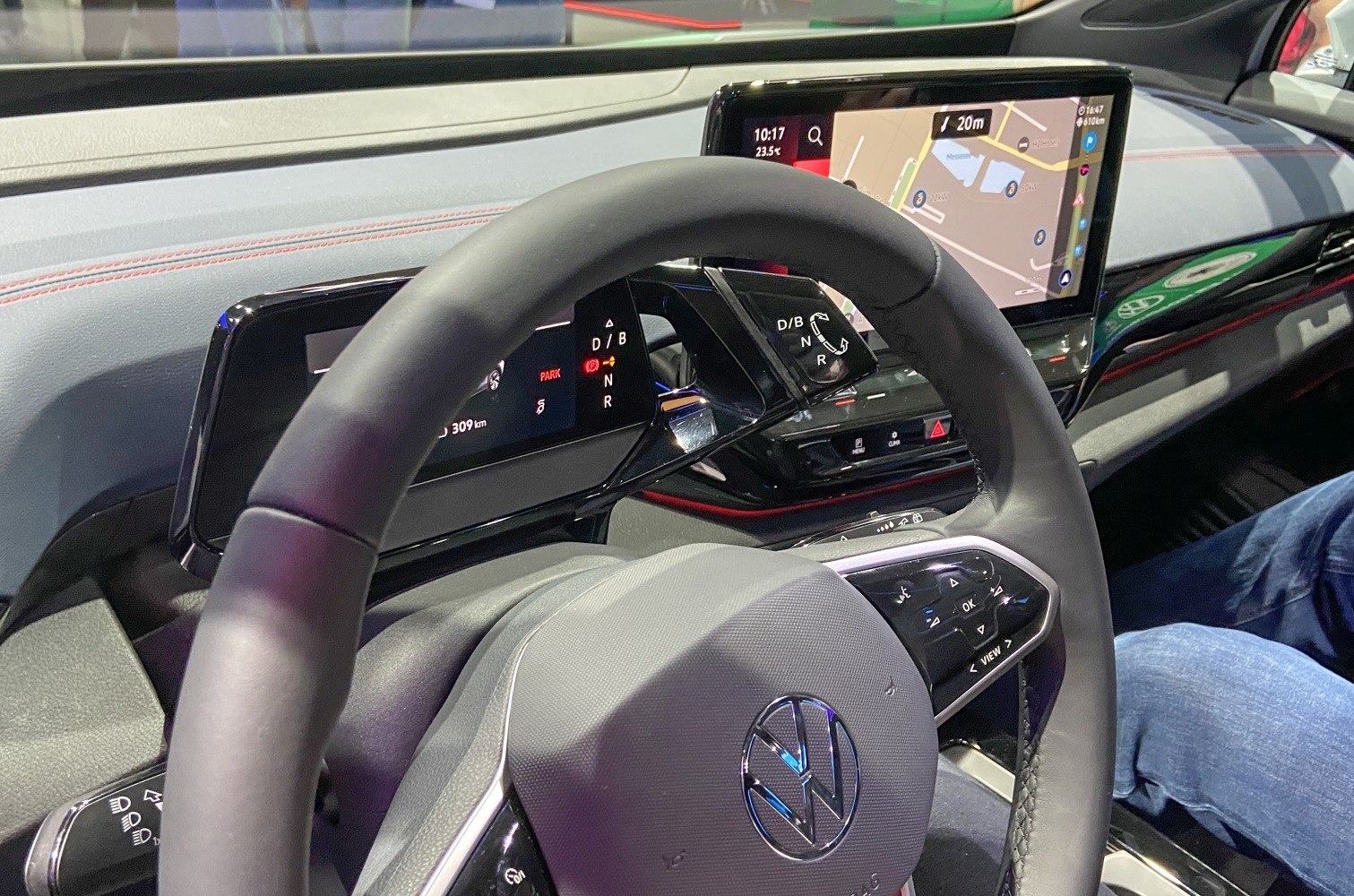 Digital dashboard and navigation touchscreen on steering wheel